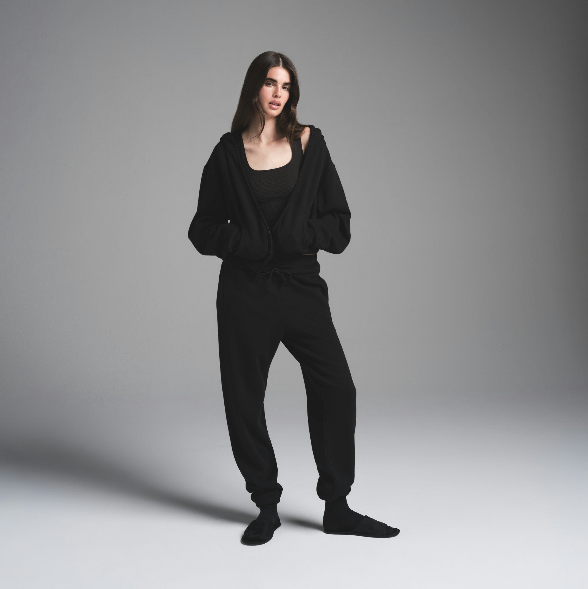 COTTON FLEECE CLASSIC ZIP UP HOODIE | ONYX ON A MODEL FRONT VIEW | FOCUS: 0.0, 1.0, 0.9