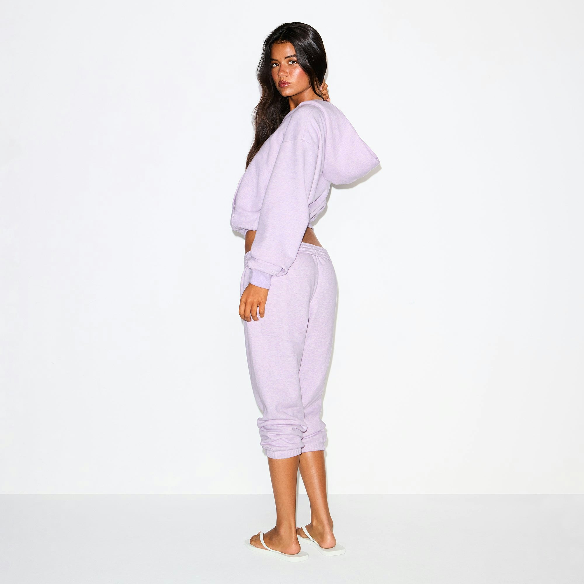 COTTON FLEECE CLASSIC ZIP UP HOODIE | PURPLE HEATHER ON A MODEL SIDE VIEW @ | FOCUS: 0.0, 1.0, 0.9