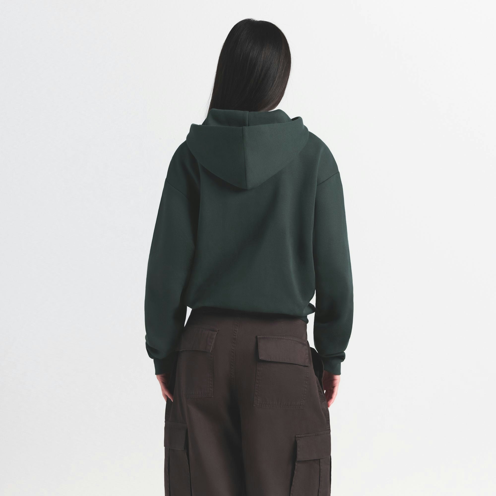 COTTON FLEECE CLASSIC ZIP UP HOODIE | SPRUCE ON A MODEL SIDE VIEW @ | FOCUS: 0.0, 1.0, 0.9