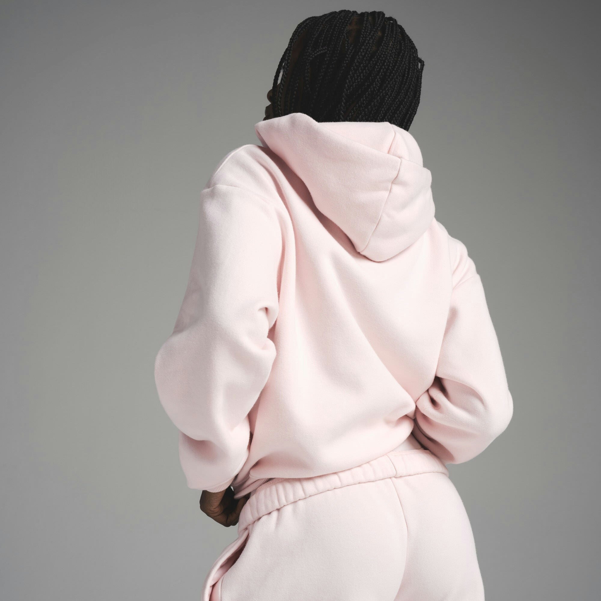 COTTON FLEECE CLASSIC ZIP UP HOODIE | BARELY PINK ON A MODEL FRONT VIEW | FOCUS: 0.0, 1.0, 0.9