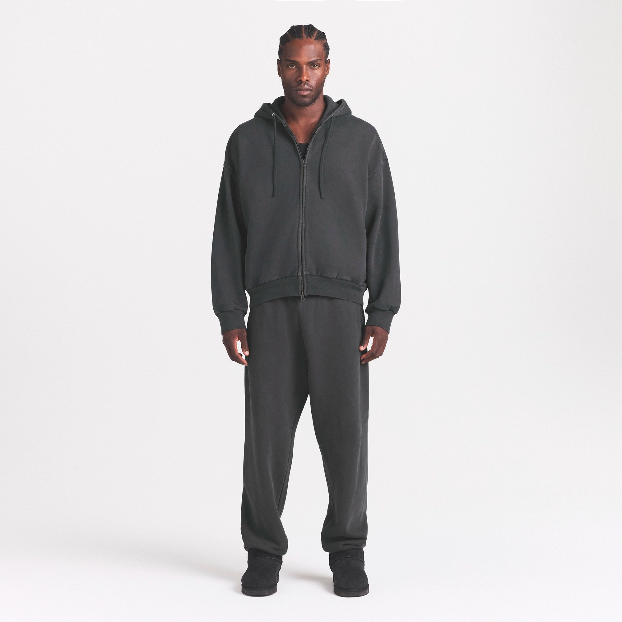 HEAVYWEIGHT FLEECE ZIP UP HOODIE | WASHED ONYX ON A MODEL FRONT VIEW