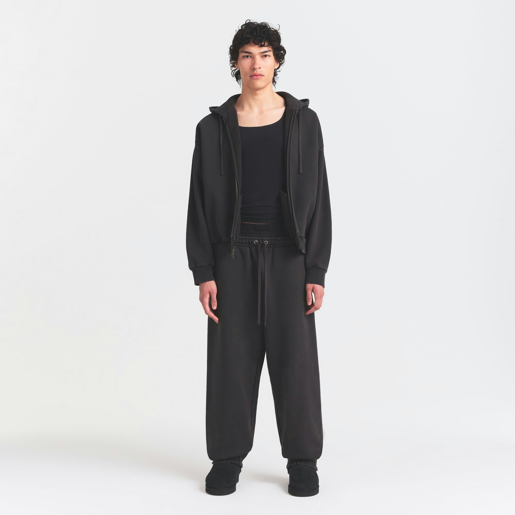 HEAVYWEIGHT FLEECE MENS ZIP UP HOODIE | WASHED ONYX ON A MODEL FRONT VIEW @ | FOCUS: 0.0, 1.0, 0.9