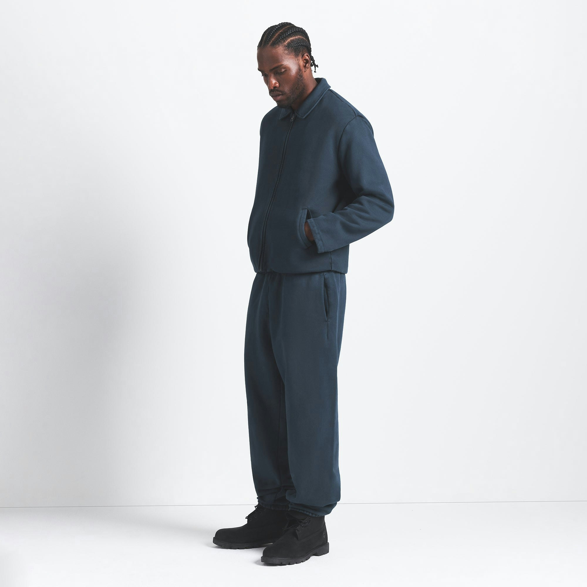 HEAVYWEIGHT FLEECE MENS ZIP UP JACKET | NAVY ON A MODEL SIDE VIEW @ | FOCUS: 0.0, 1.0, 0.9