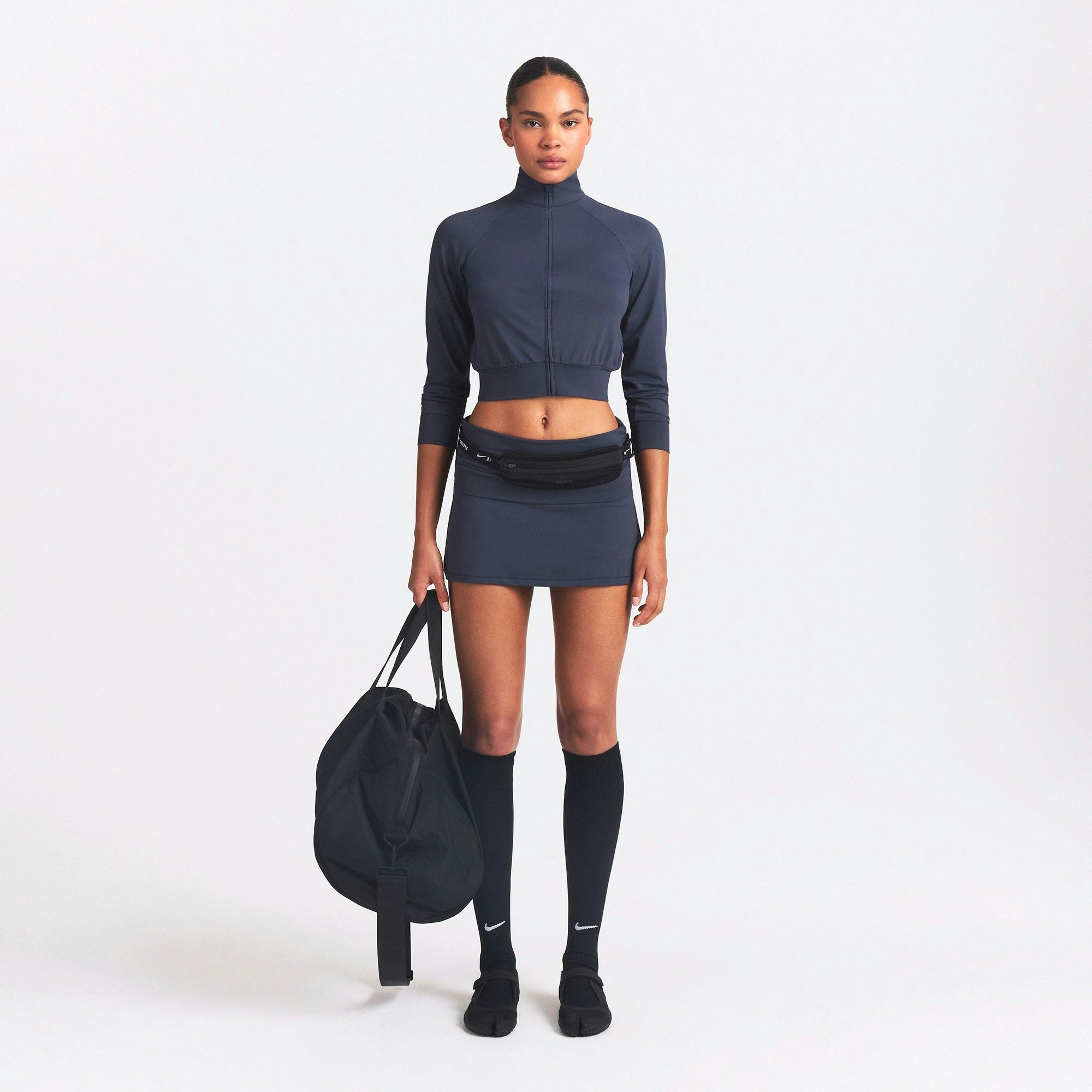 NikeSKIMS AIRY TRACK JACKET | DEEP ROYAL ON A MODEL FRONT VIEW @ | FOCUS: 0.0, 1.0, 0.9