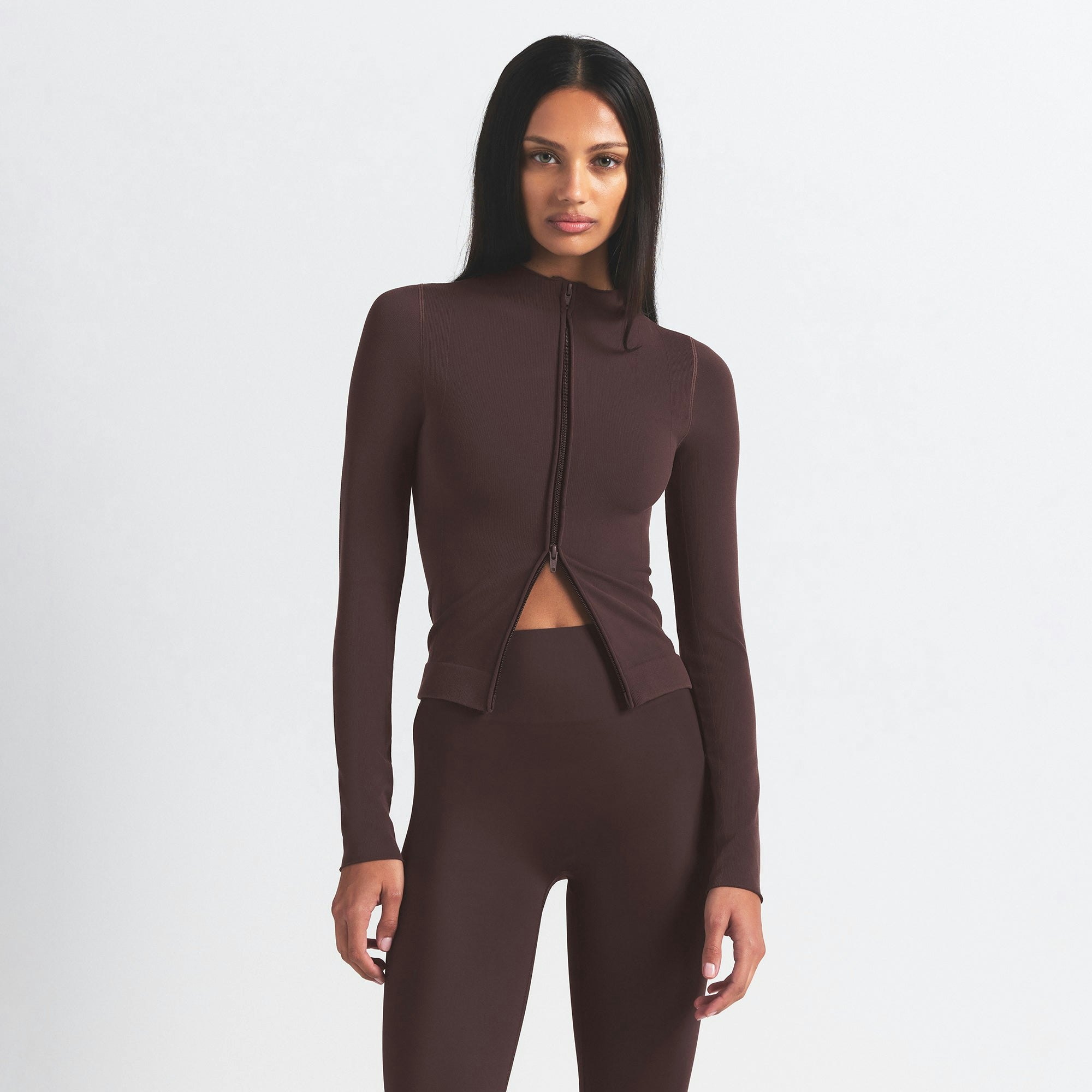 NikeSKIMS VINTAGE SEAMLESS FULL ZIP JACKET | PHOENIX ON A MODEL SIDE VIEW @ | FOCUS: 0.0, 1.0, 0.9