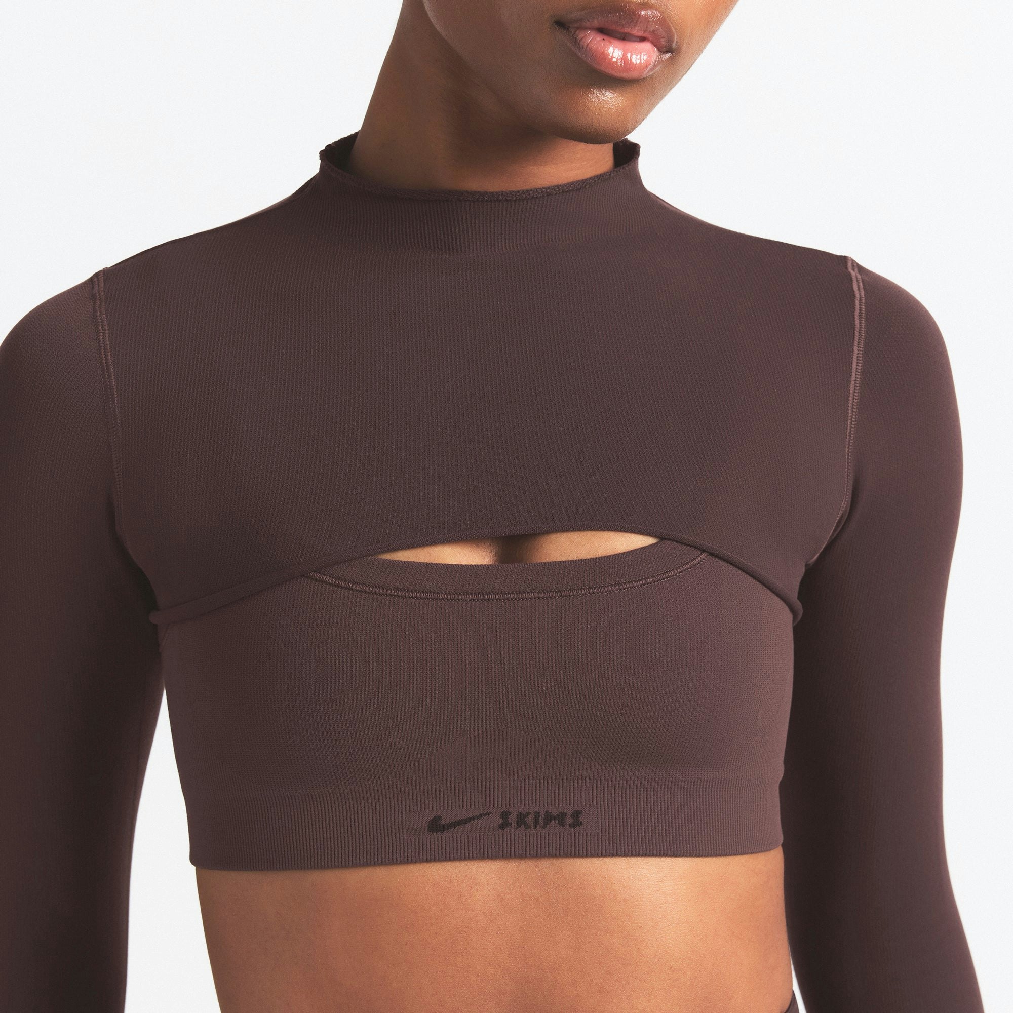 NikeSKIMS VINTAGE SEAMLESS SHRUG | PHOENIX ON A MODEL SIDE VIEW @ | FOCUS: 0.9, 0.1, 0.7