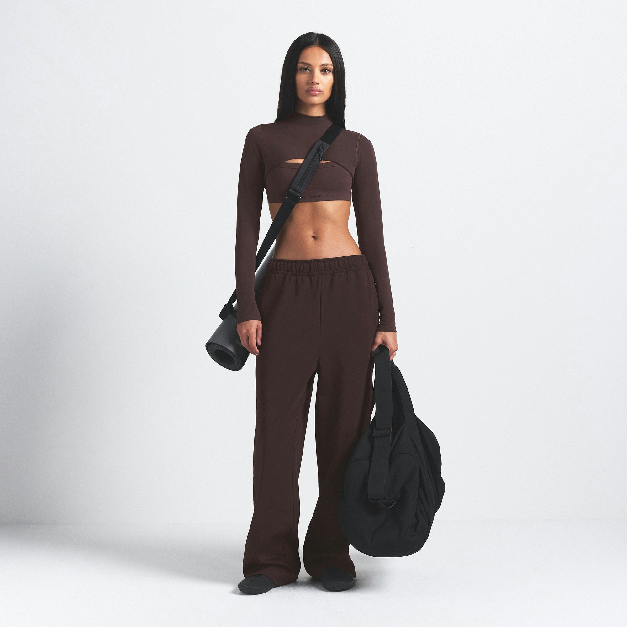 NikeSKIMS VINTAGE SEAMLESS SHRUG | PHOENIX ON A MODEL FRONT VIEW @ | FOCUS: 0.9, 0.1, 0.7