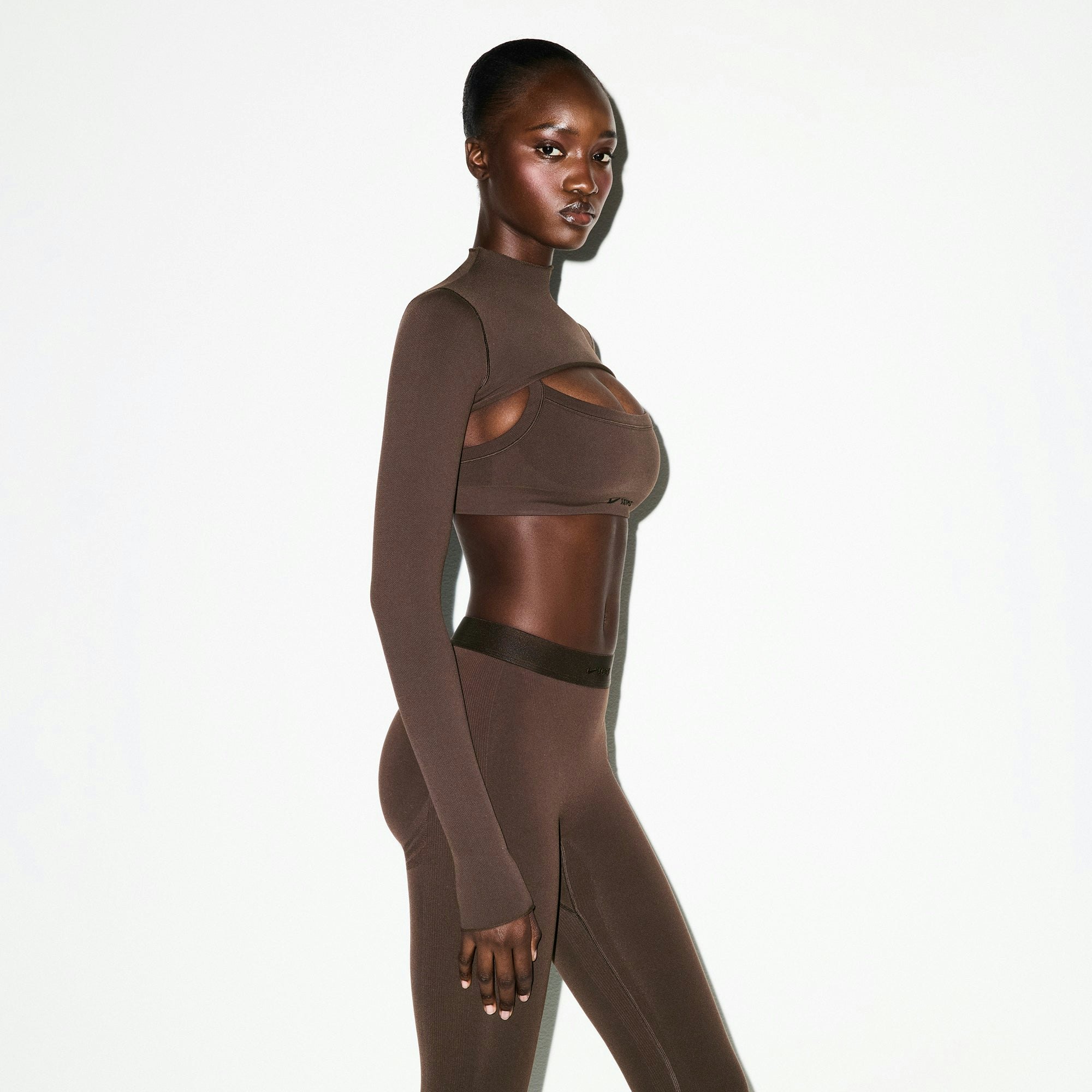 NikeSKIMS VINTAGE SEAMLESS SHRUG | PHOENIX ON A MODEL SIDE VIEW @ | FOCUS: 0.0, 1.0, 0.9