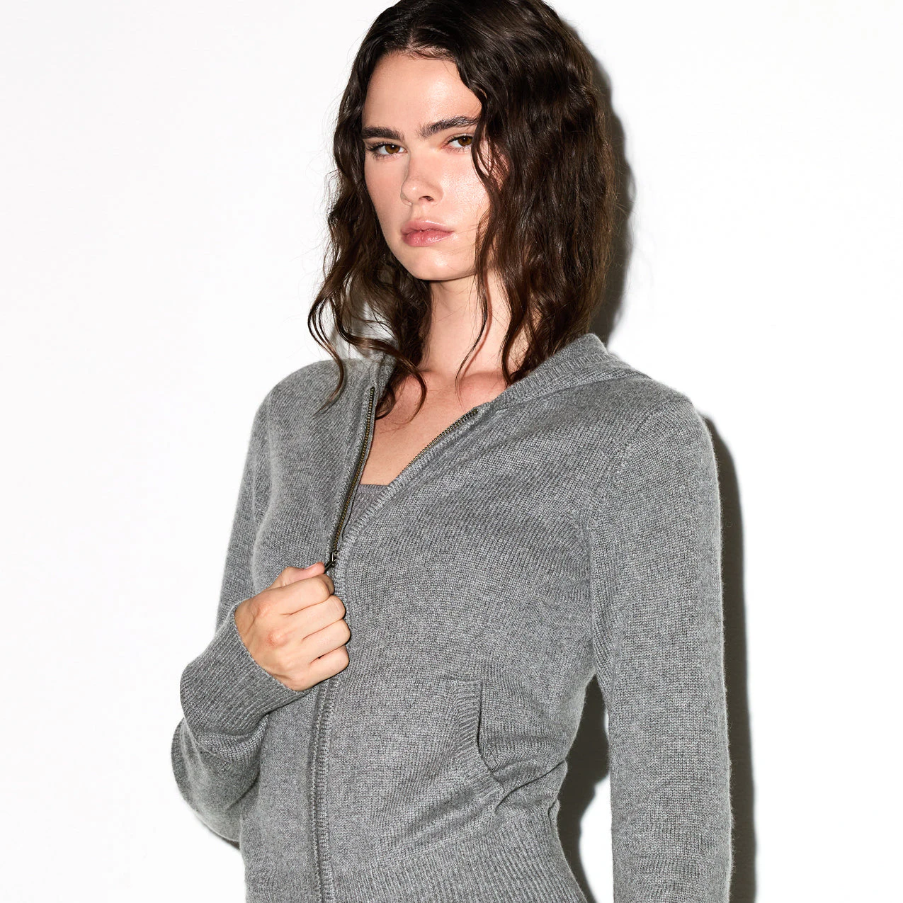 CASHMERE ZIP UP HOODIE | DARK HEATHER GREY ON A MODEL SIDE VIEW @ | FOCUS: 0.0, 1.0, 0.9