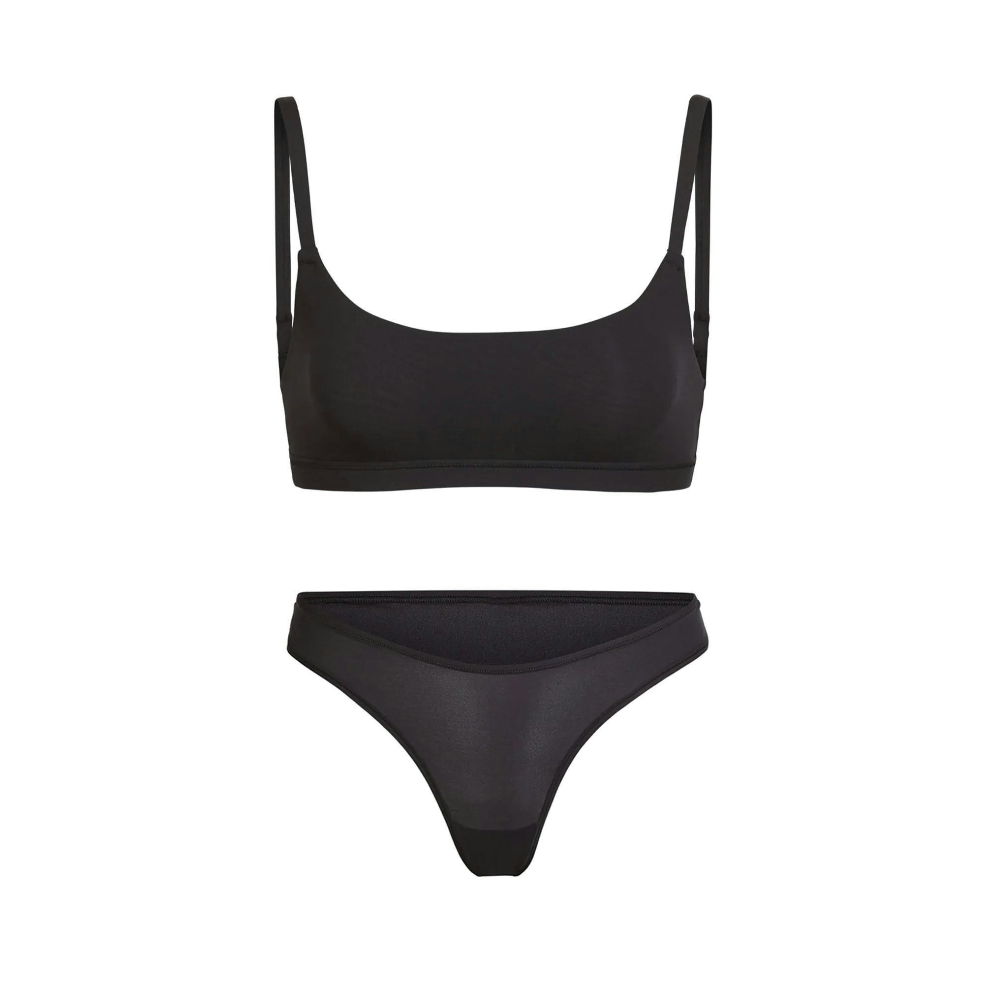 FITS EVERYBODY ESSENTIALS SET LAYS FLAT ON A WHITE BACKGROUND | FLT