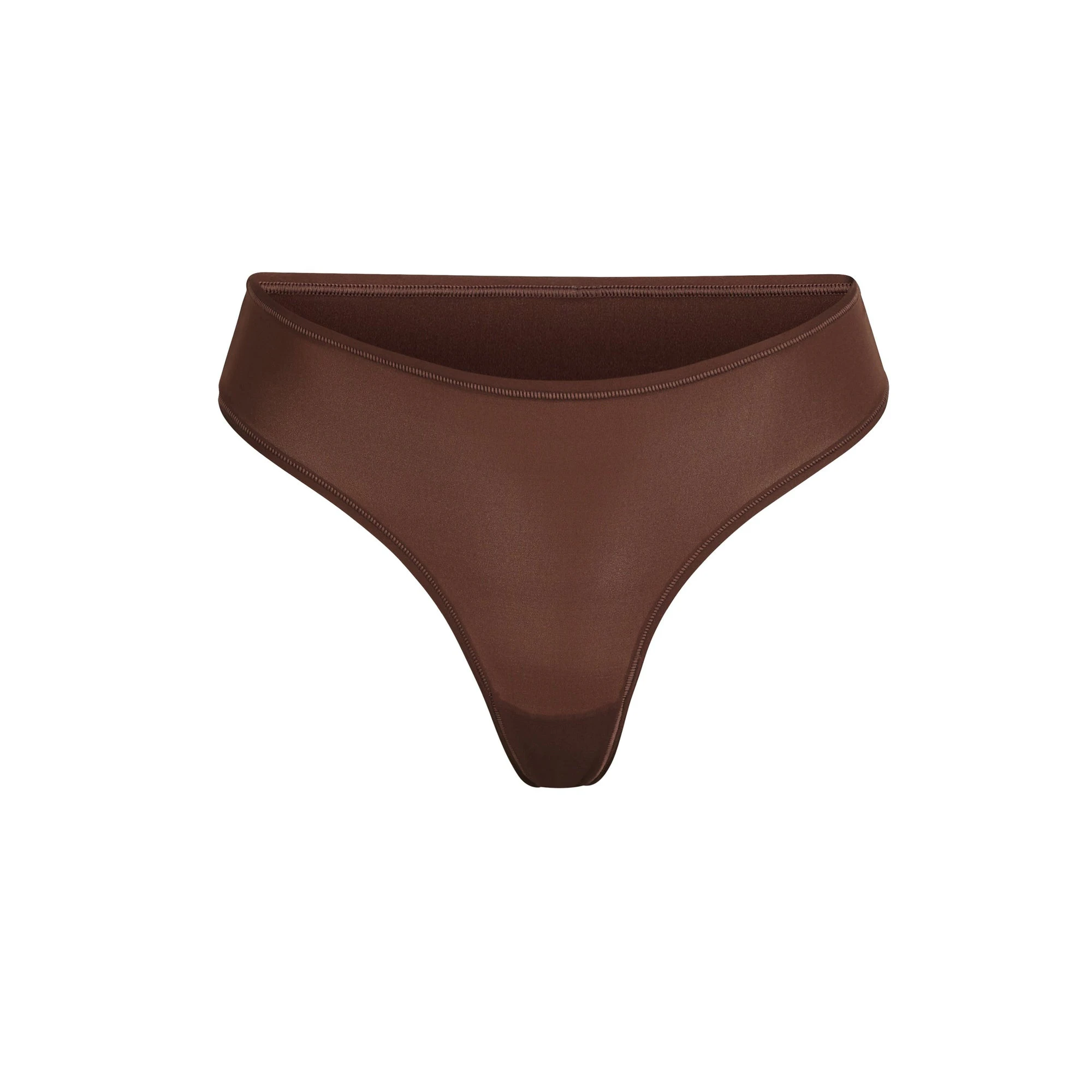 A close-up of the SKIMS Fits Everybody Thong in Cocoa, emphasizing its smooth, stretchy fabric.