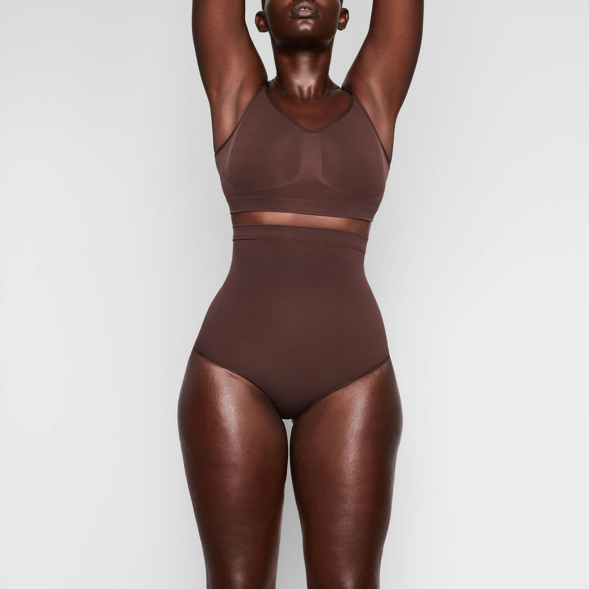 SEAMLESS SCULPT HIGH-WAISTED BRIEF WORN BY A MODEL IN FRONT VIEW | SEE: M, L, XL