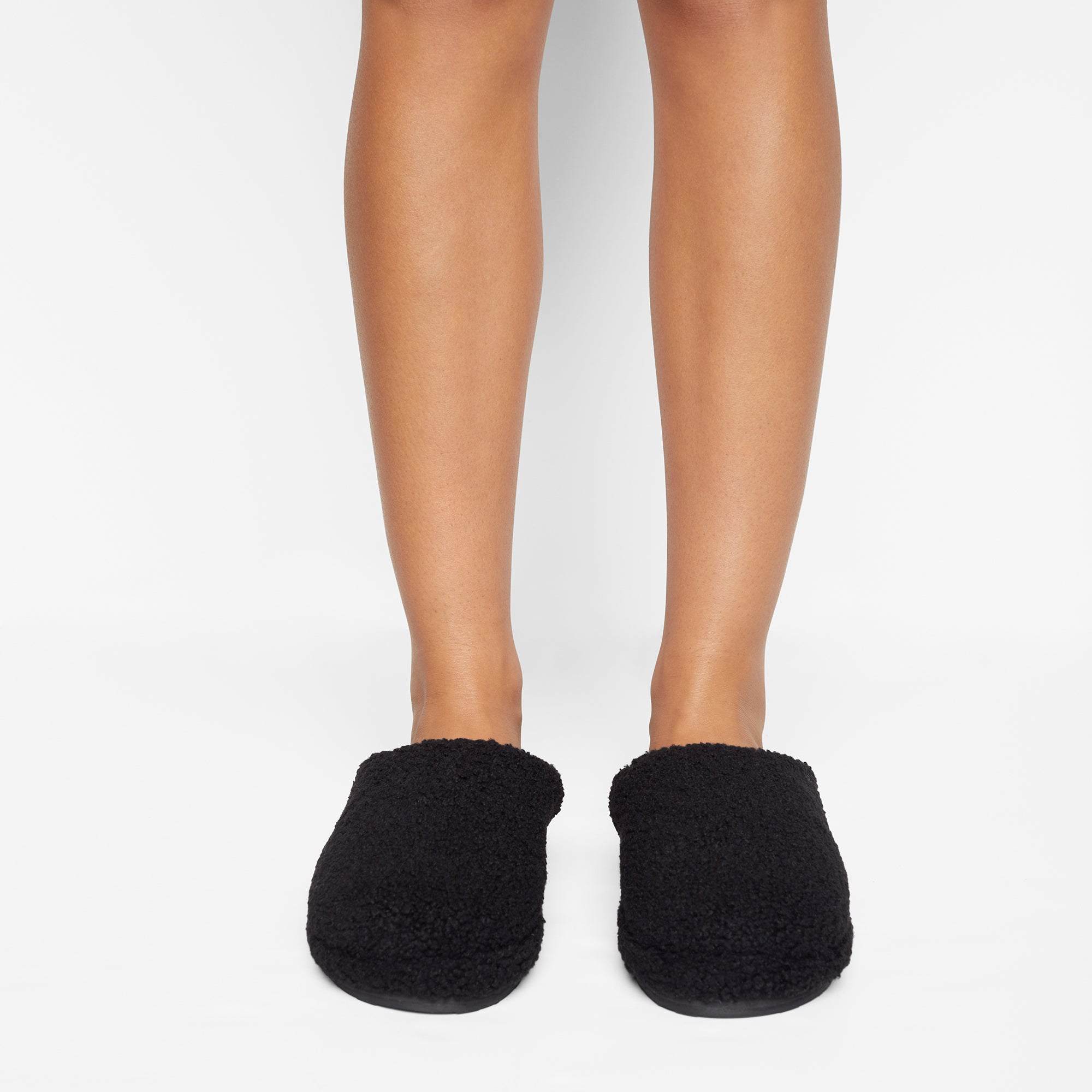 TEDDY SHERPA SLIPPER WORN BY A MODEL IN FRONT VIEW