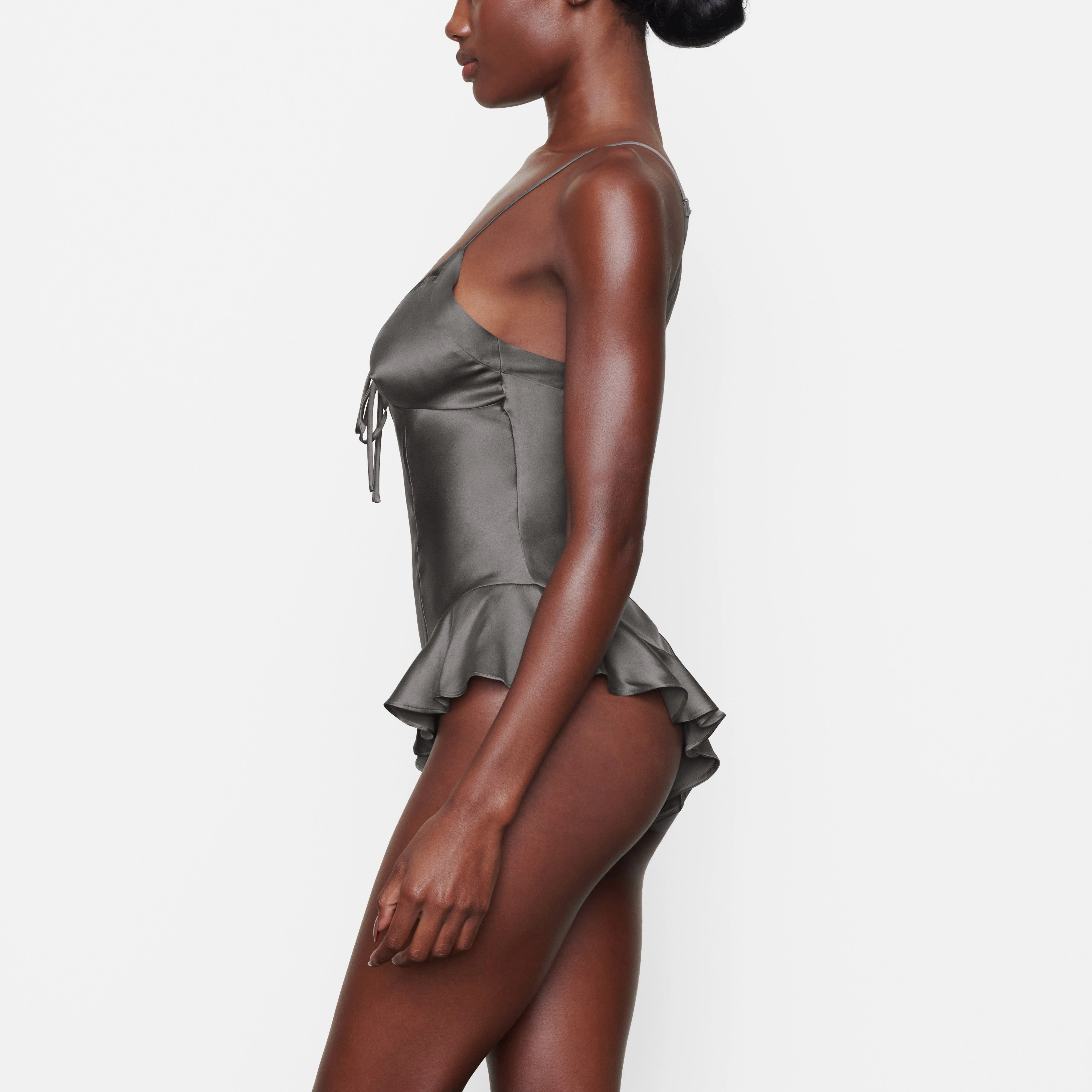 SILK TEDDY ON A MODEL