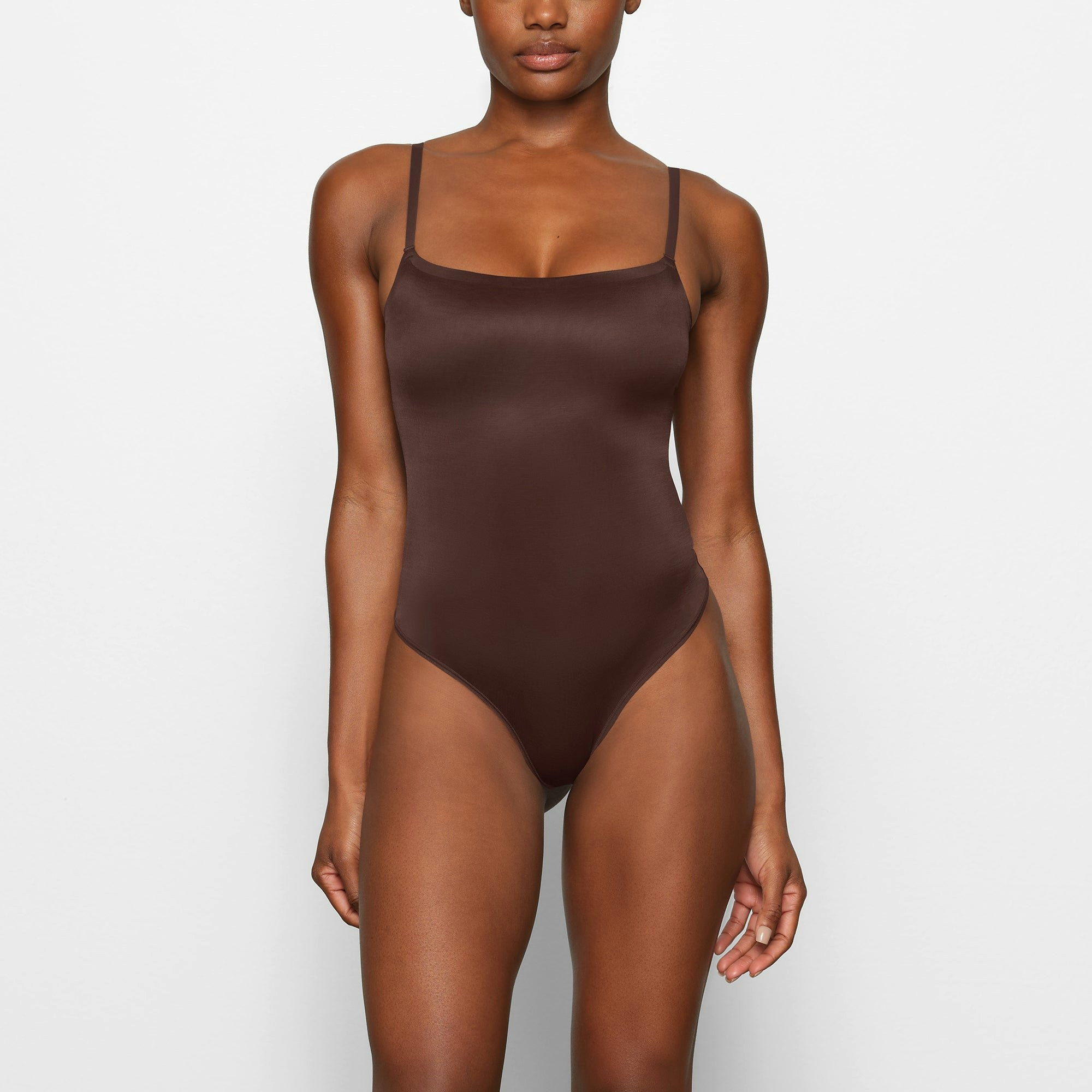 BARELY THERE SCOOP BODYSUIT WORN BY A MODEL IN FRONT VIEW | SEE: XXS, XS, S