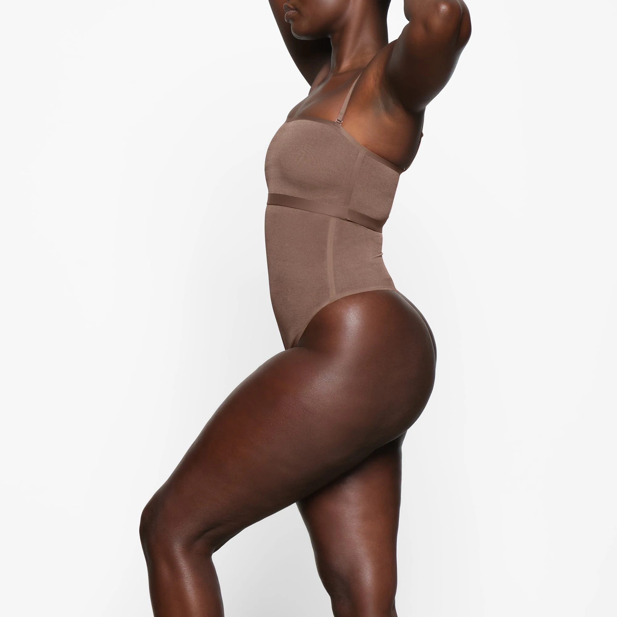 SHEER SCULPT BANDEAU WORN BY A MODEL IN SIDE VIEW