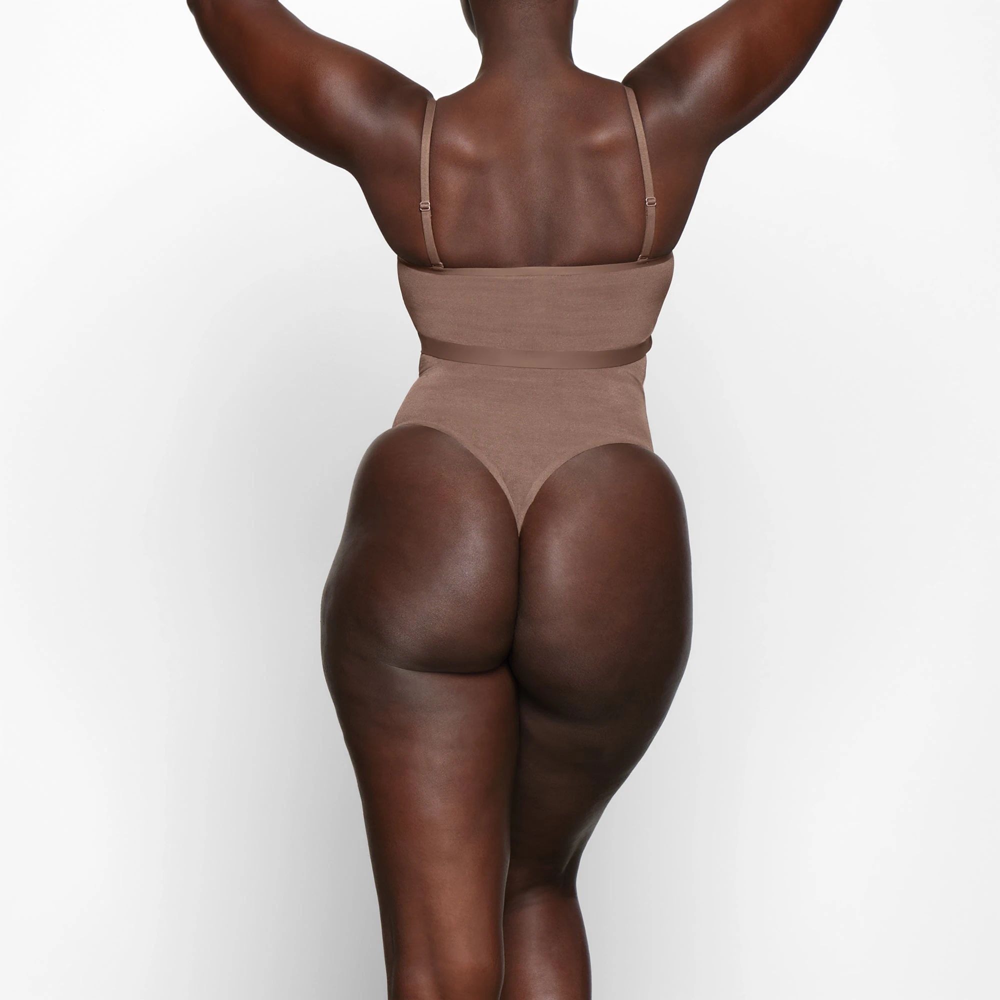 SHEER SCULPT BANDEAU WORN BY A MODEL IN BACK VIEW
