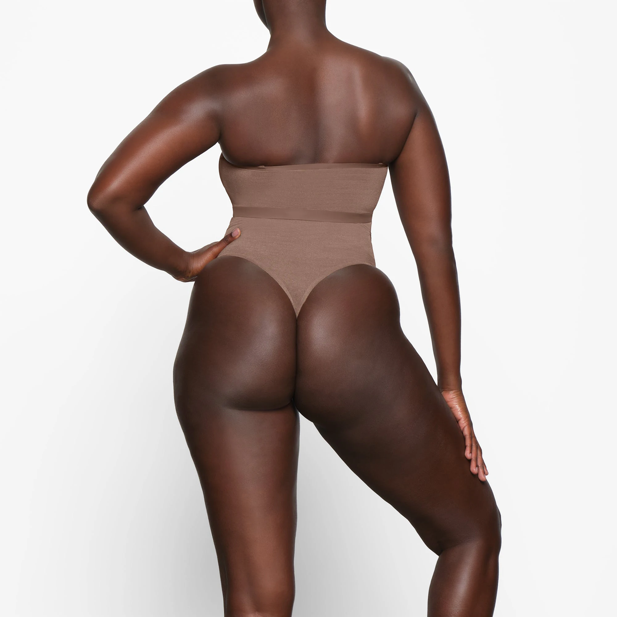 SHEER SCULPT BANDEAU WORN BY A MODEL IN BACK VIEW