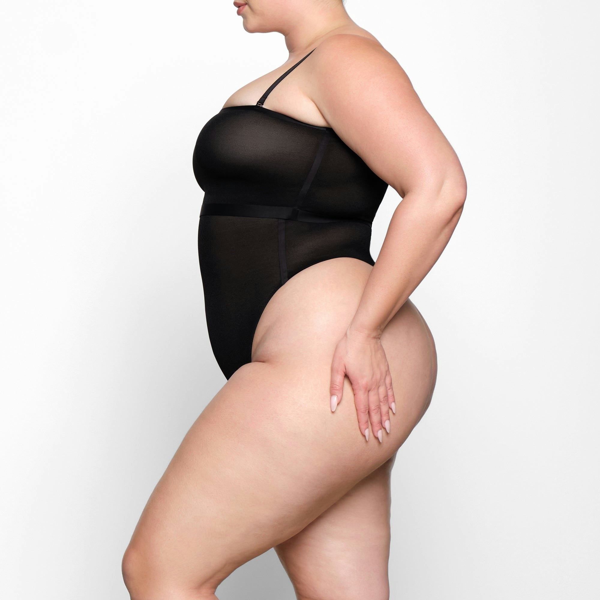 SHEER SCULPT BANDEAU WORN BY A MODEL IN SIDE VIEW