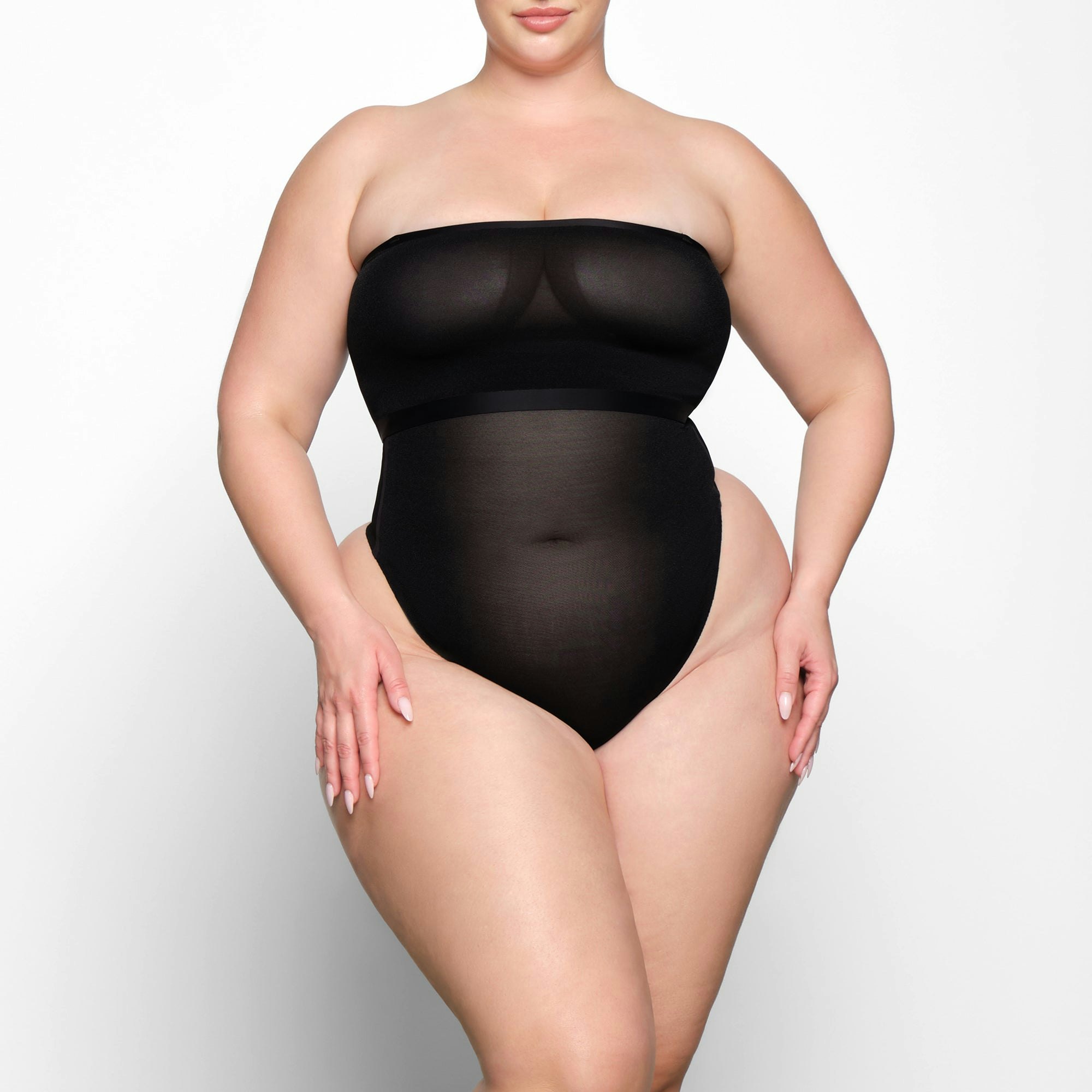 SHEER SCULPT BANDEAU WORN BY A MODEL IN FRONT VIEW