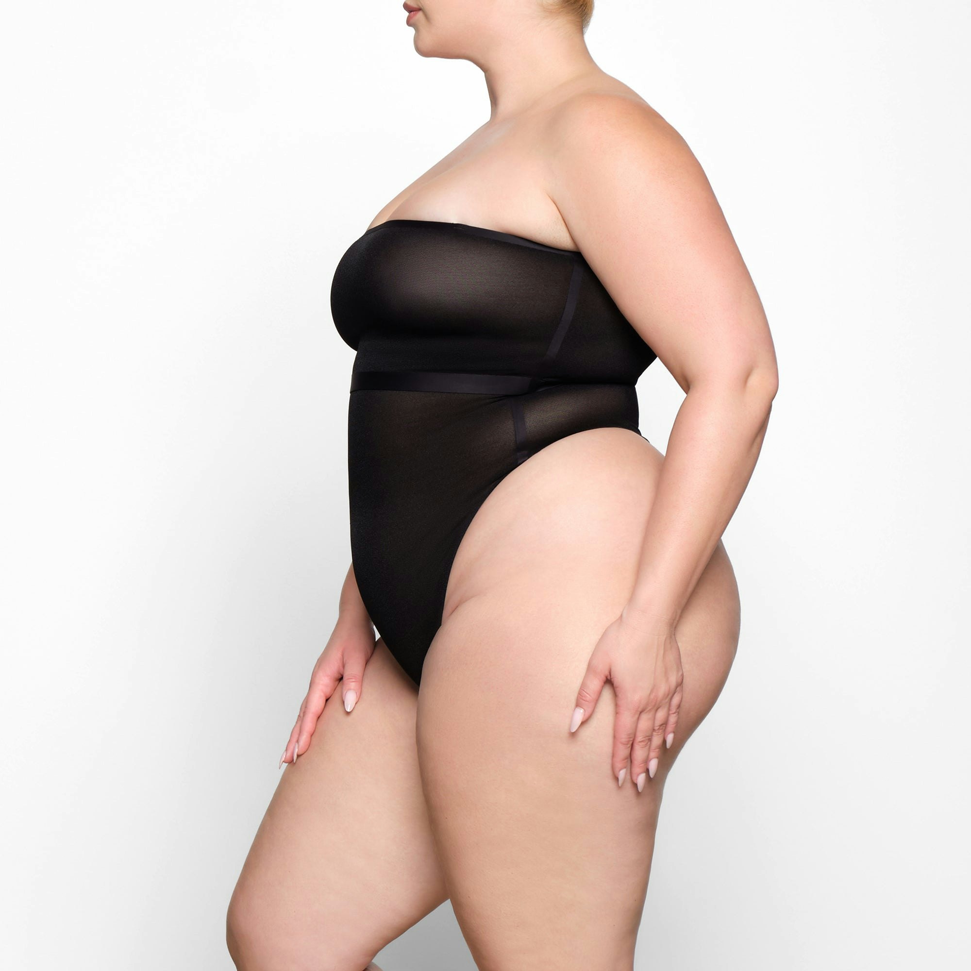 SHEER SCULPT BANDEAU WORN BY A MODEL IN SIDE VIEW