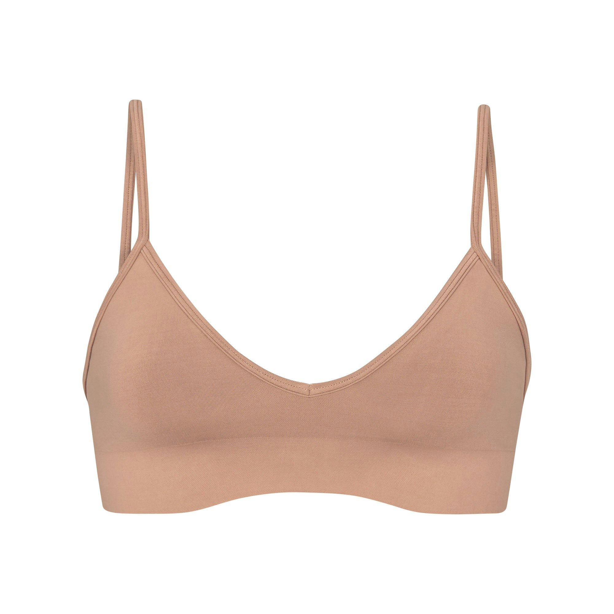 SOFT SMOOTHING SEAMLESS BRALETTE | SIENNA (TRIANGLE BRALETTES) LAYS FLAT ON A WHITE BACKGROUND | FLT