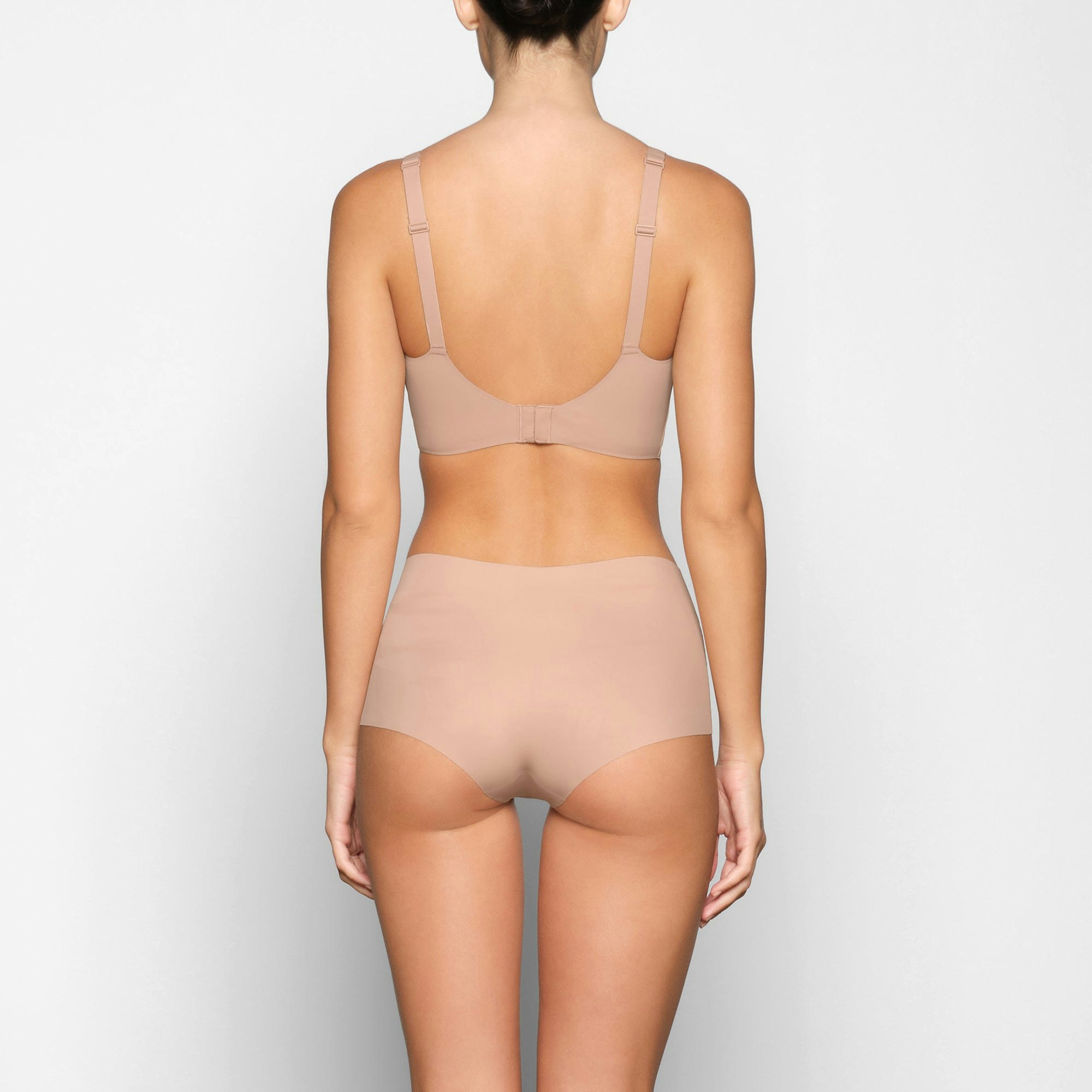 NAKED SCOOP BRA ON A MODEL BACK VIEW