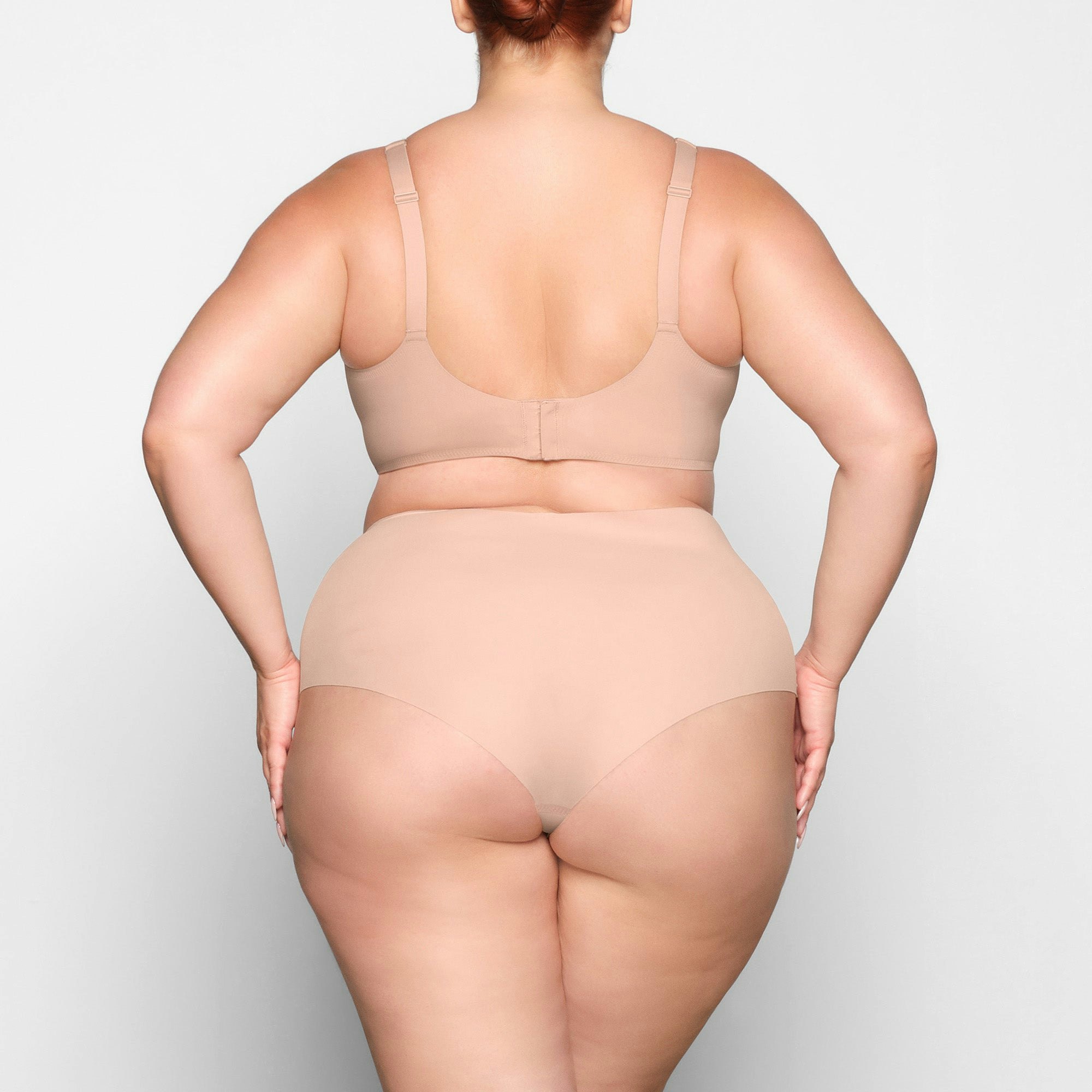 NAKED SCOOP BRA ON A MODEL BACK VIEW