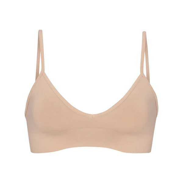 SOFT SMOOTHING SEAMLESS BRALETTE | CLAY (TRIANGLE BRALETTES) LAYS FLAT ON A WHITE BACKGROUND | FLT