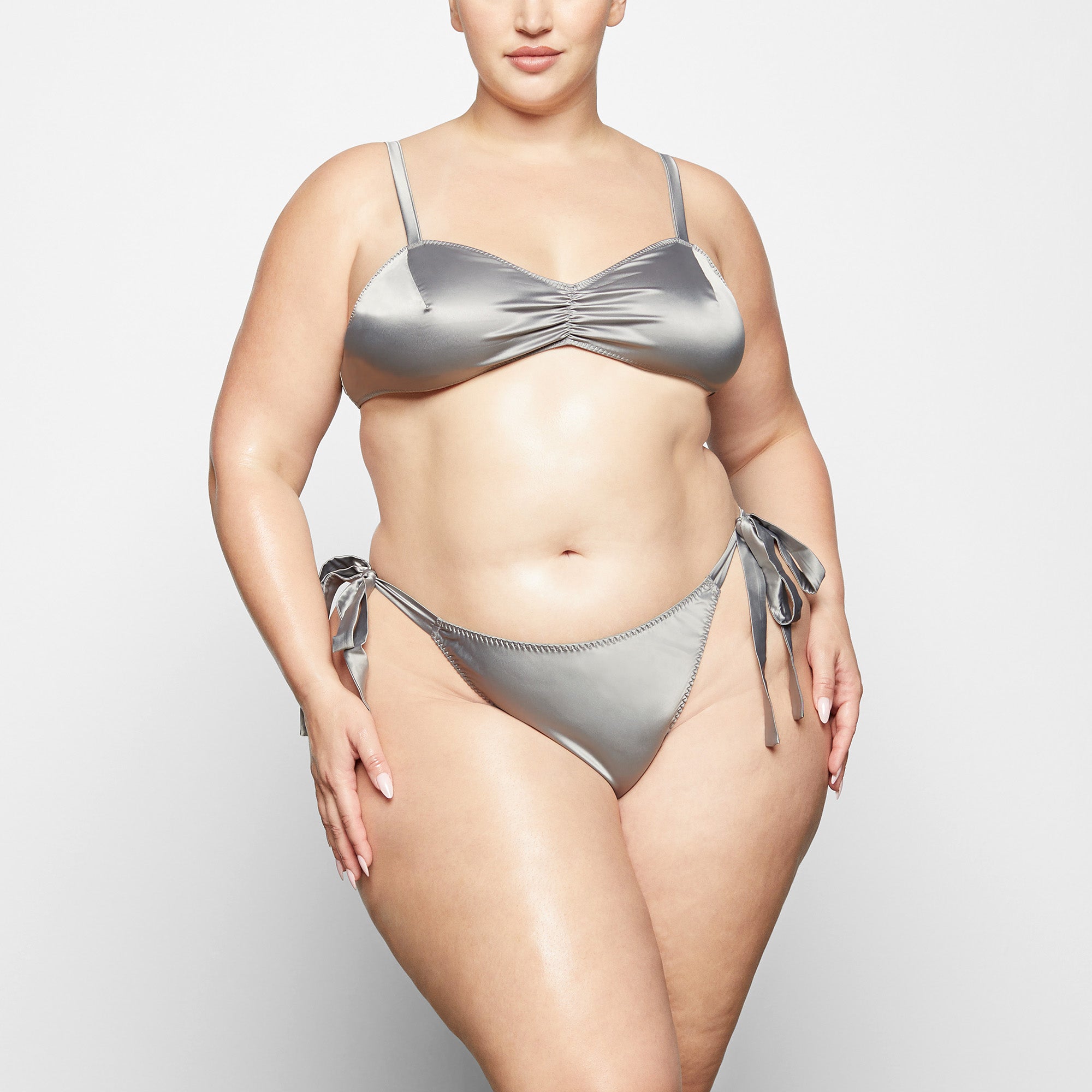 WOVEN SHINE TIE BACK BRALETTE WORN BY A MODEL IN FRONT VIEW | SEE: 2X, 3X, 4X