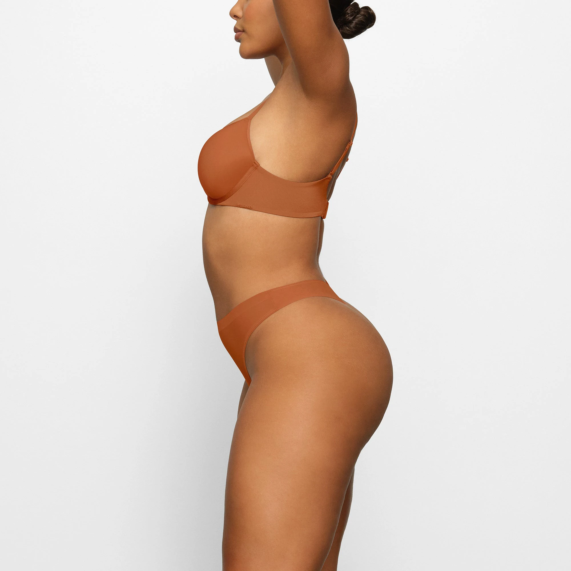 WEIGHTLESS DEMI BRA WORN BY A MODEL IN SIDE VIEW