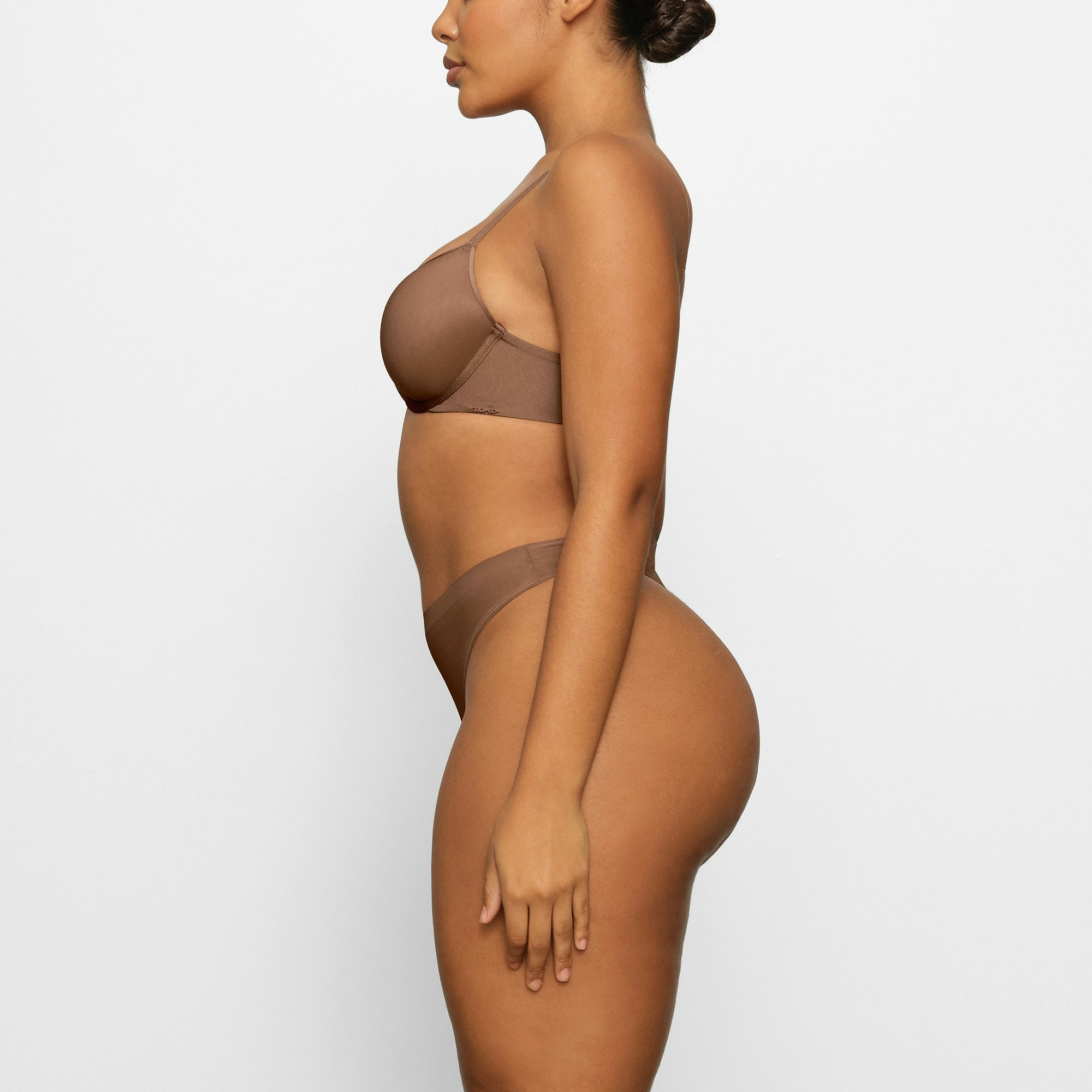WEIGHTLESS DEMI BRA WORN BY A MODEL IN SIDE VIEW
