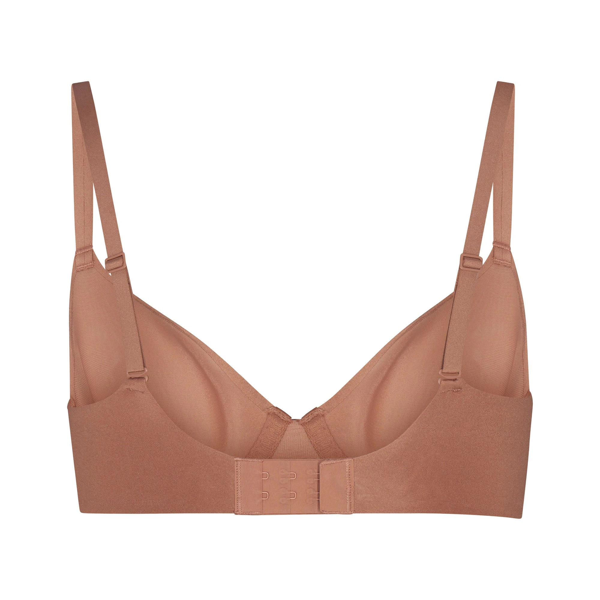 WEIGHTLESS DEMI BRA LAYS FLAT ON A WHITE BACKGROUND | FLT