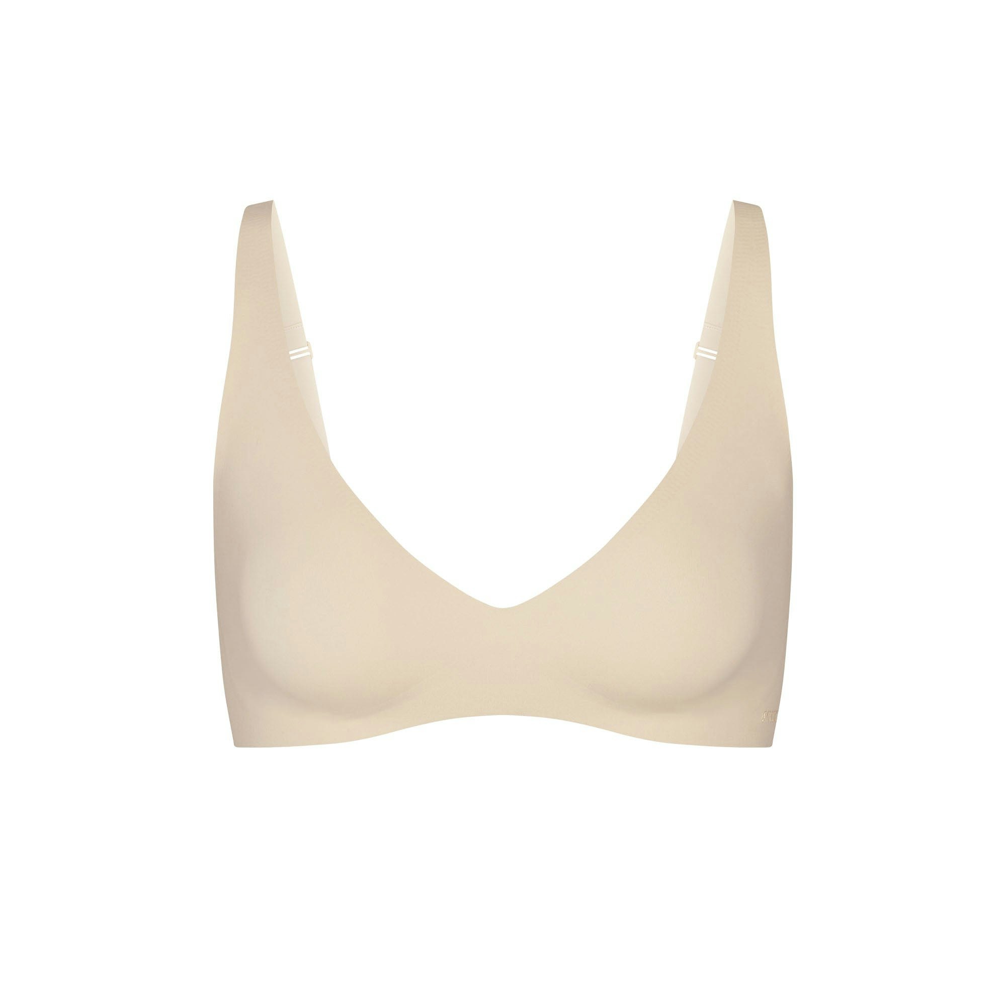 NAKED PLUNGE BRALETTE | SAND (PLUNGE BRALETTES) LAYS FLAT ON A WHITE BACKGROUND | FLT