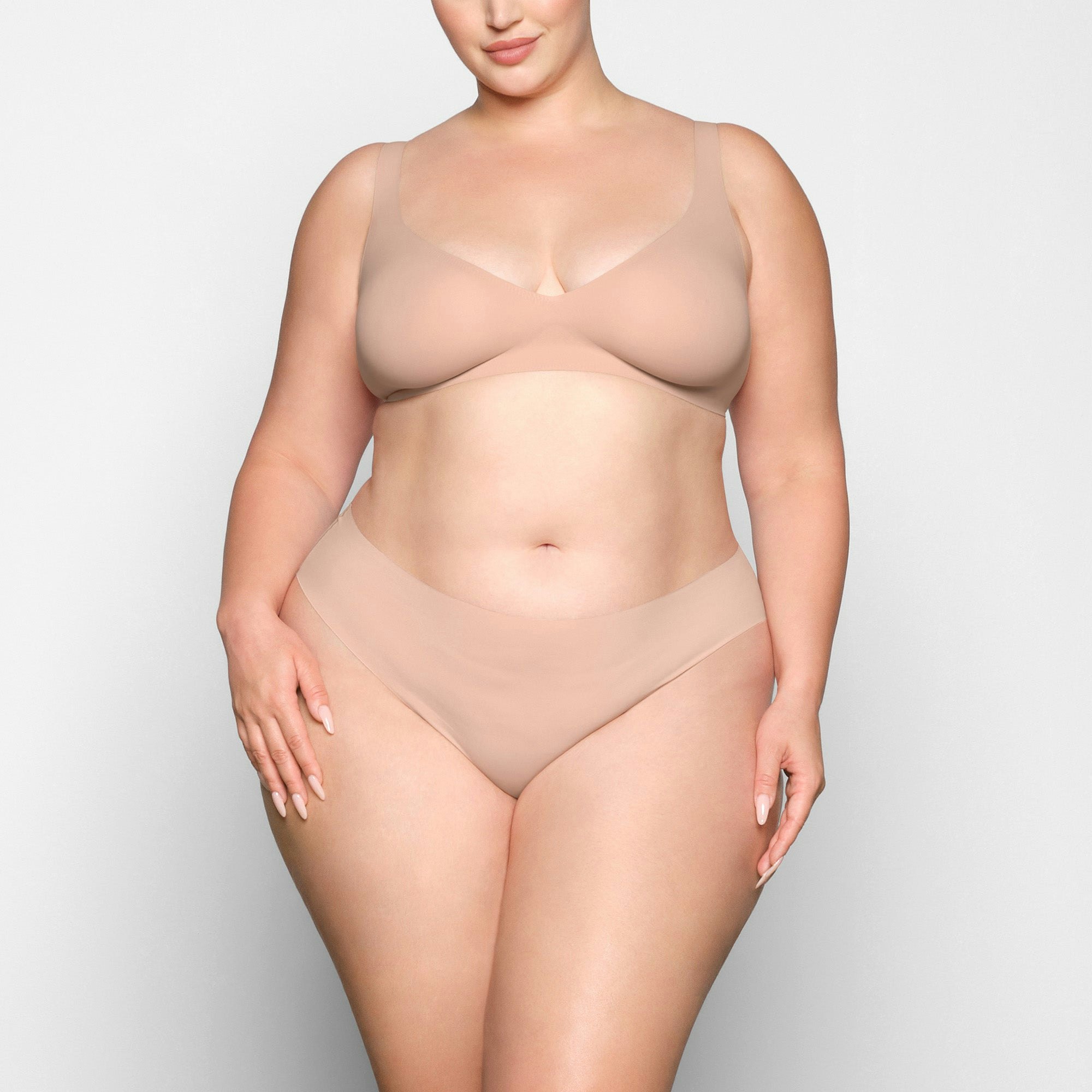 NAKED PLUNGE BRA WORN BY A MODEL IN FRONT VIEW | SEE: 2X, 3X, 4X