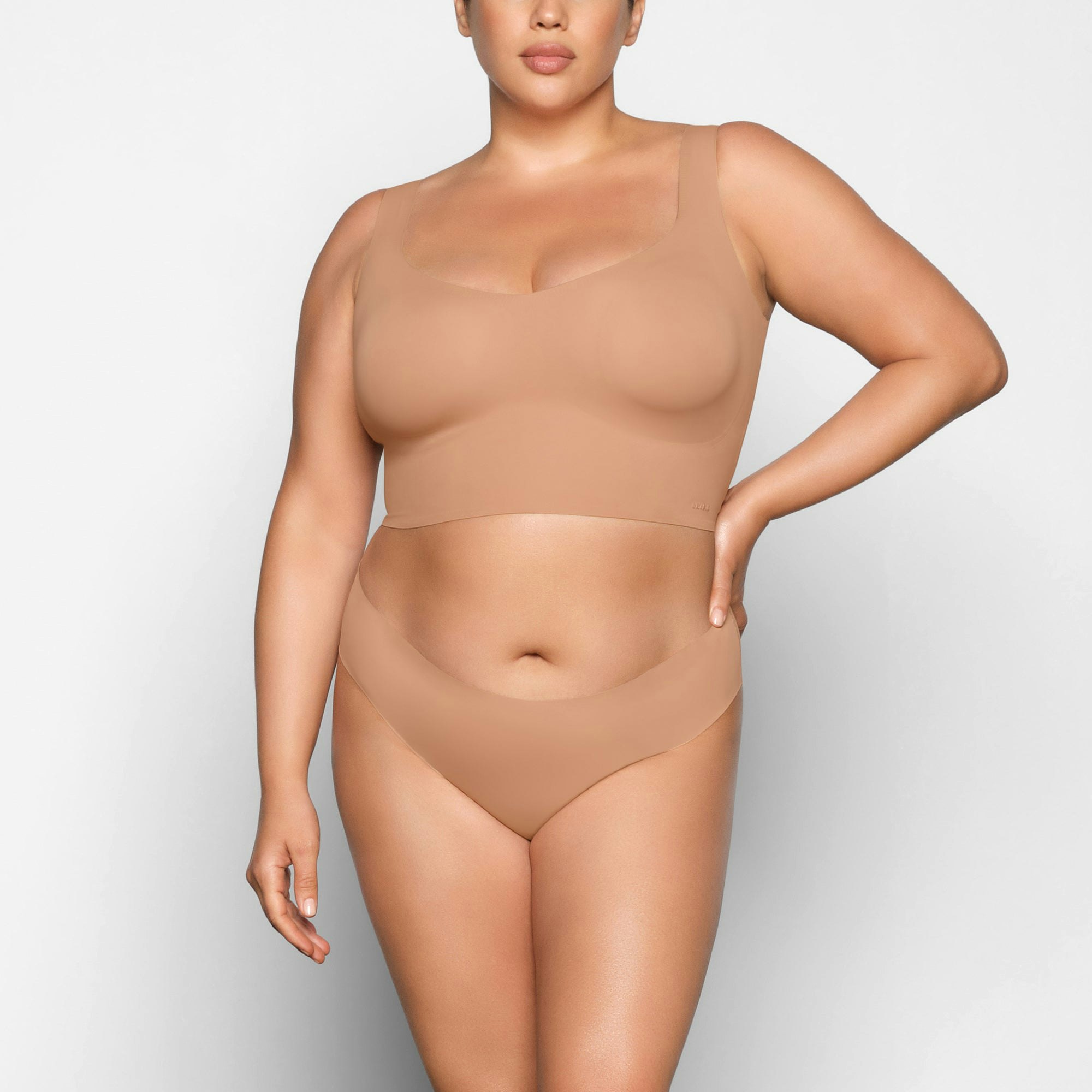 NAKED PLUNGE LONGLINE BRA WORN BY A MODEL IN FRONT VIEW | SEE: 2X, 3X, 4X