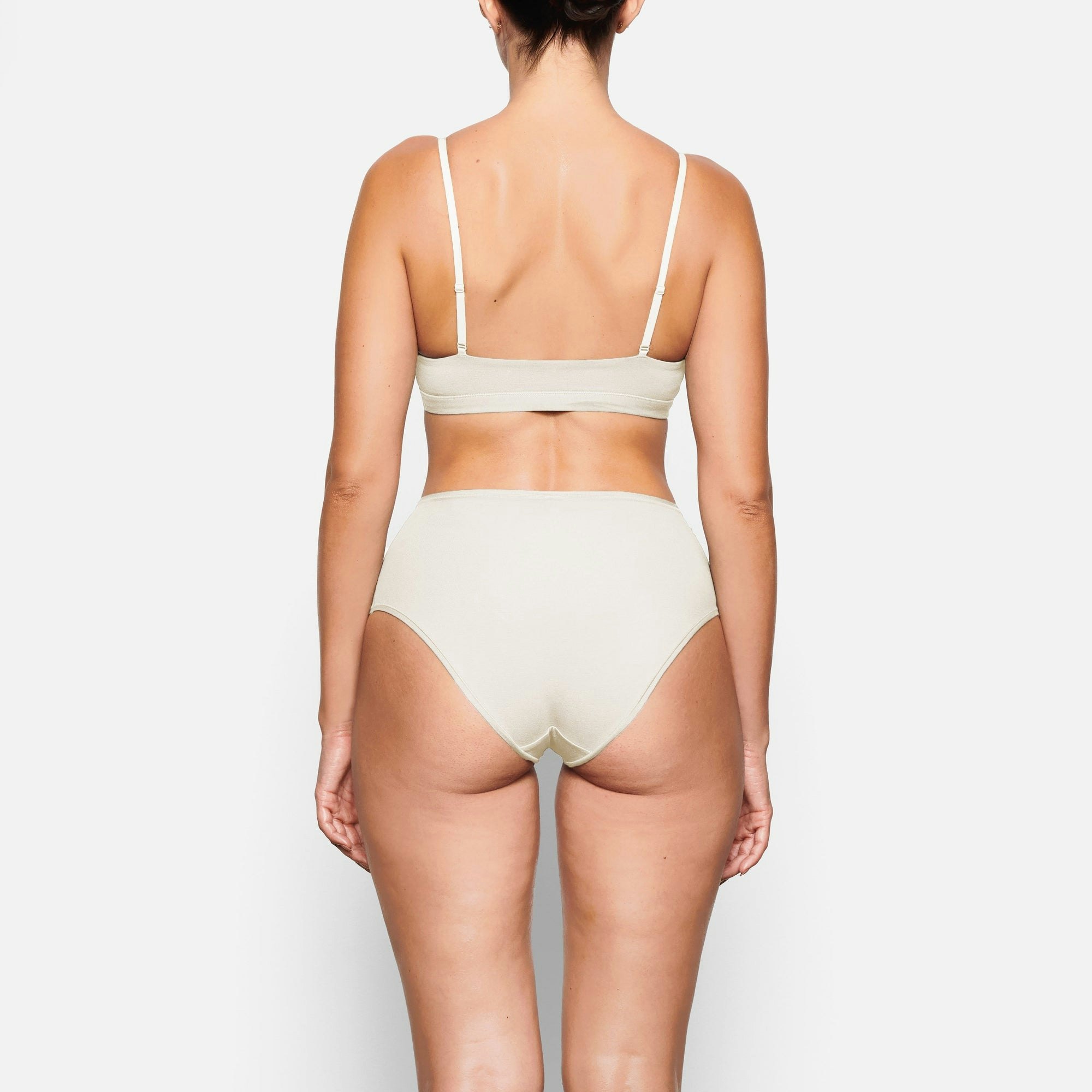 BACK VIEW OF THE COTTON JERSEY FULL BRIEF ON A MODEL