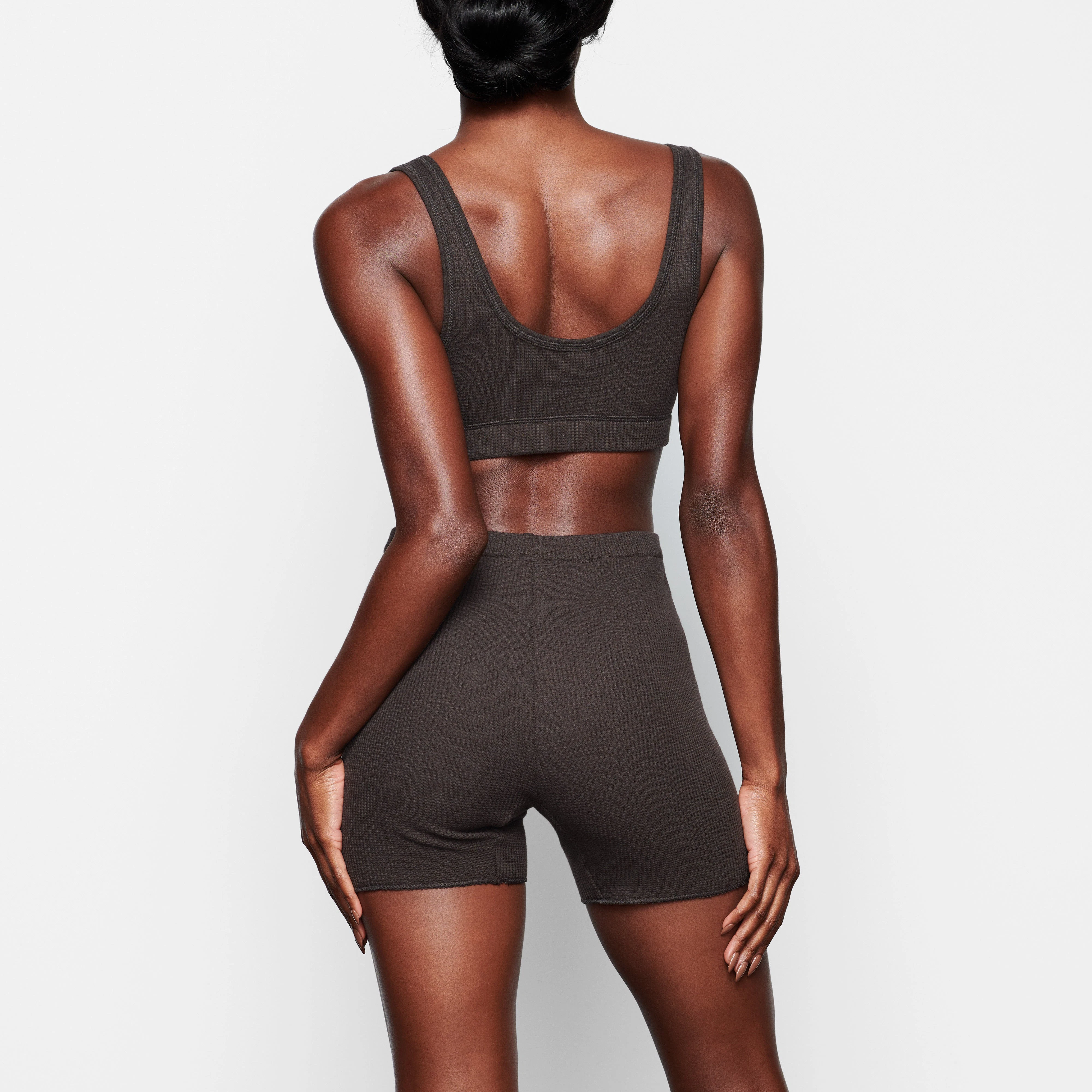 A MODEL WEARS THE WAFFLE HENLEY BRA