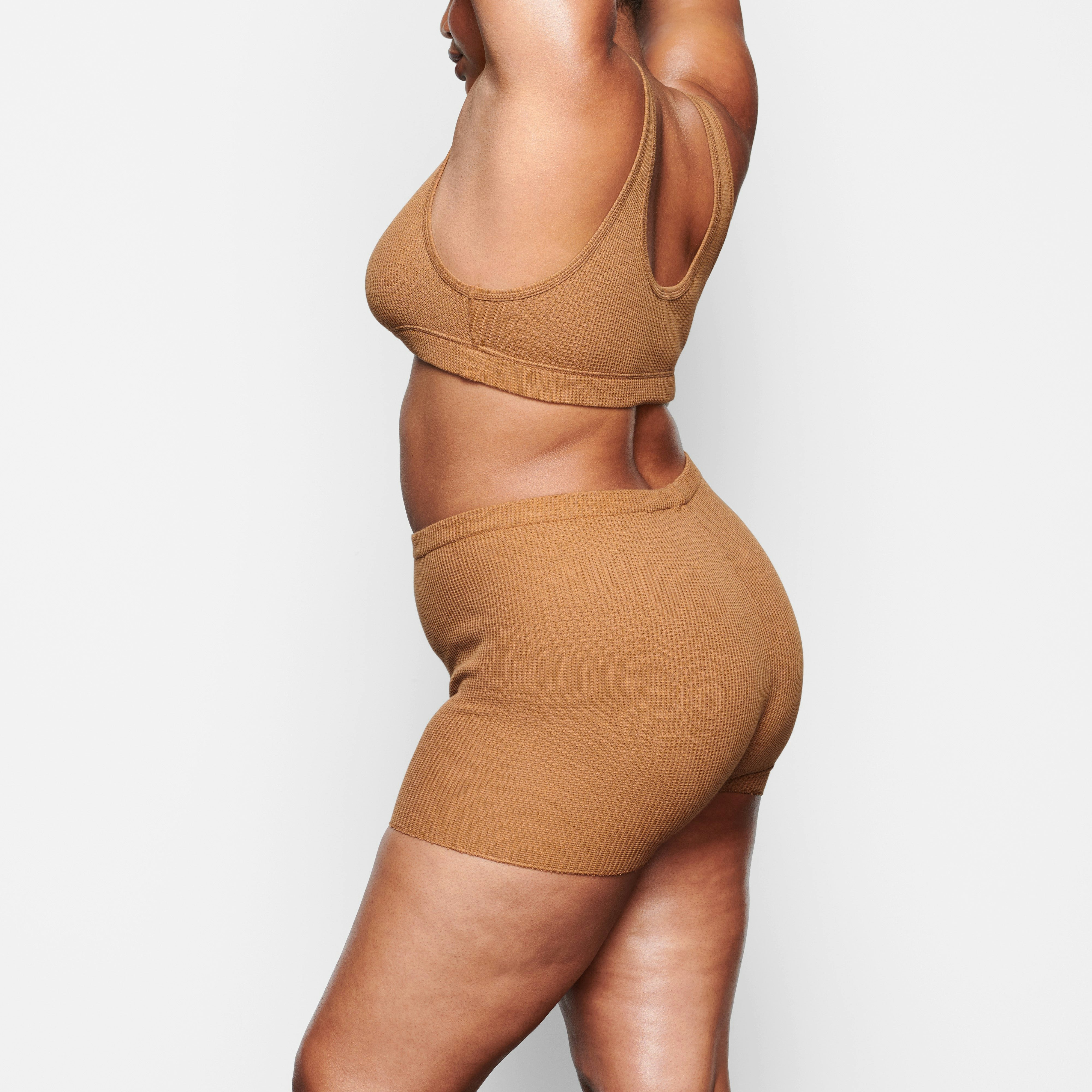 A MODEL WEARS THE WAFFLE HENLEY BRA