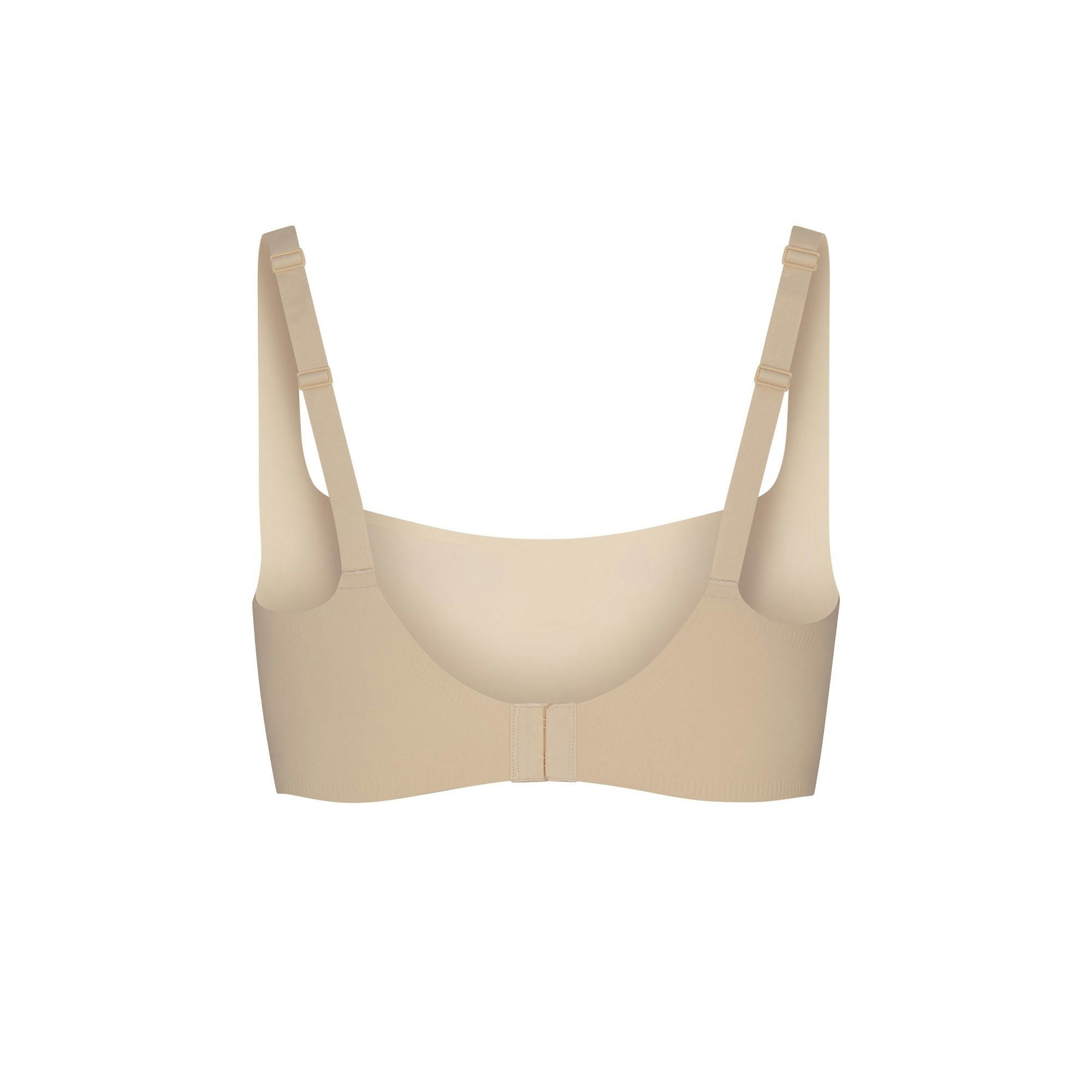 NAKED SCOOP BRA LAYS FLAT ON A WHITE BACKGROUND | FLT