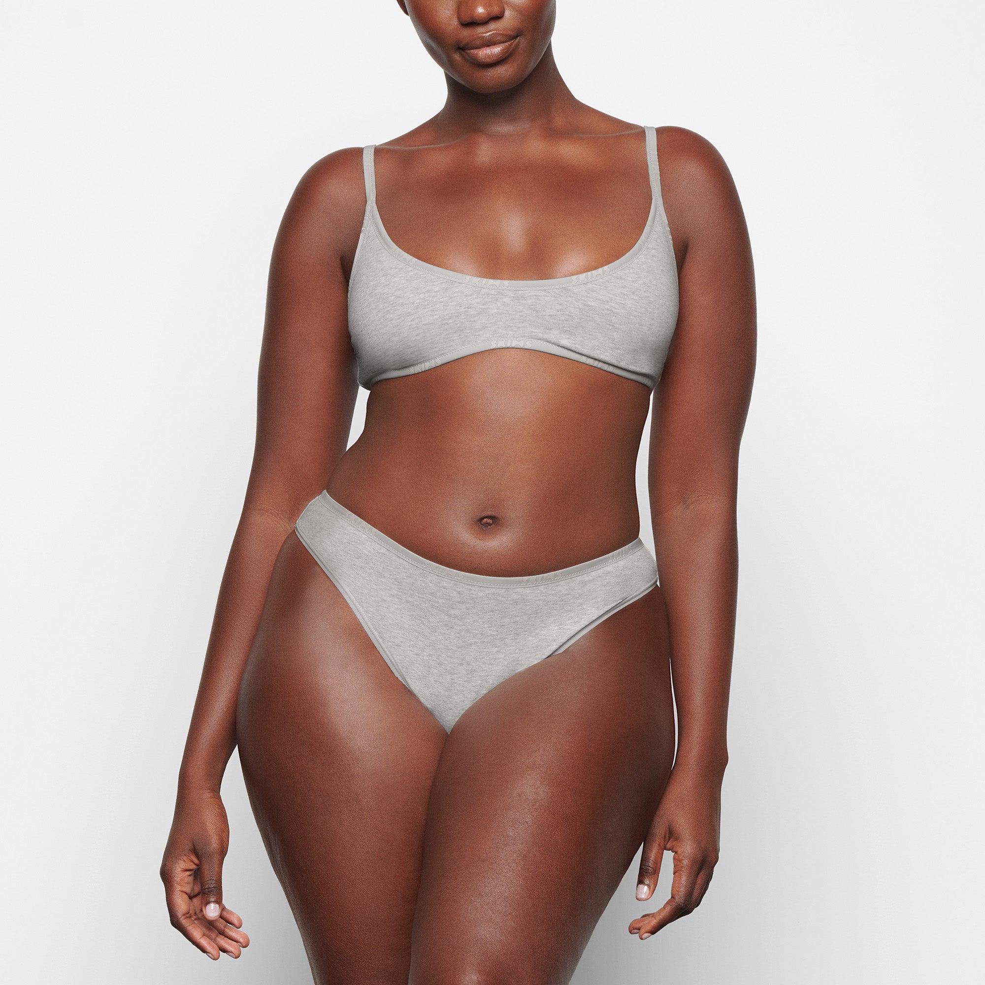 COTTON LOGO SCOOP NECK BRALETTE WORN BY A MODEL IN FRONT VIEW