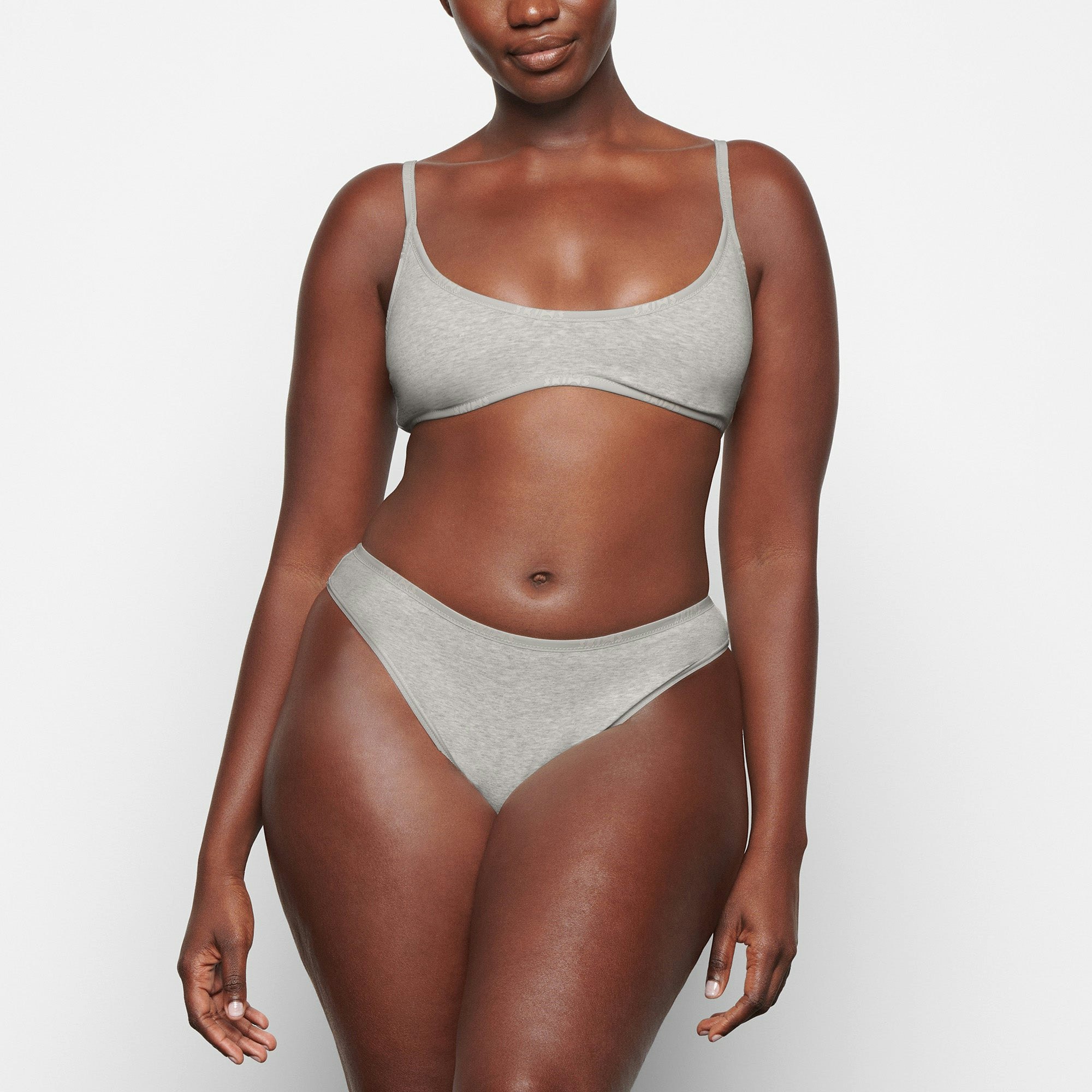 COTTON LOGO SCOOP NECK BRALETTE WORN BY A MODEL IN FRONT VIEW