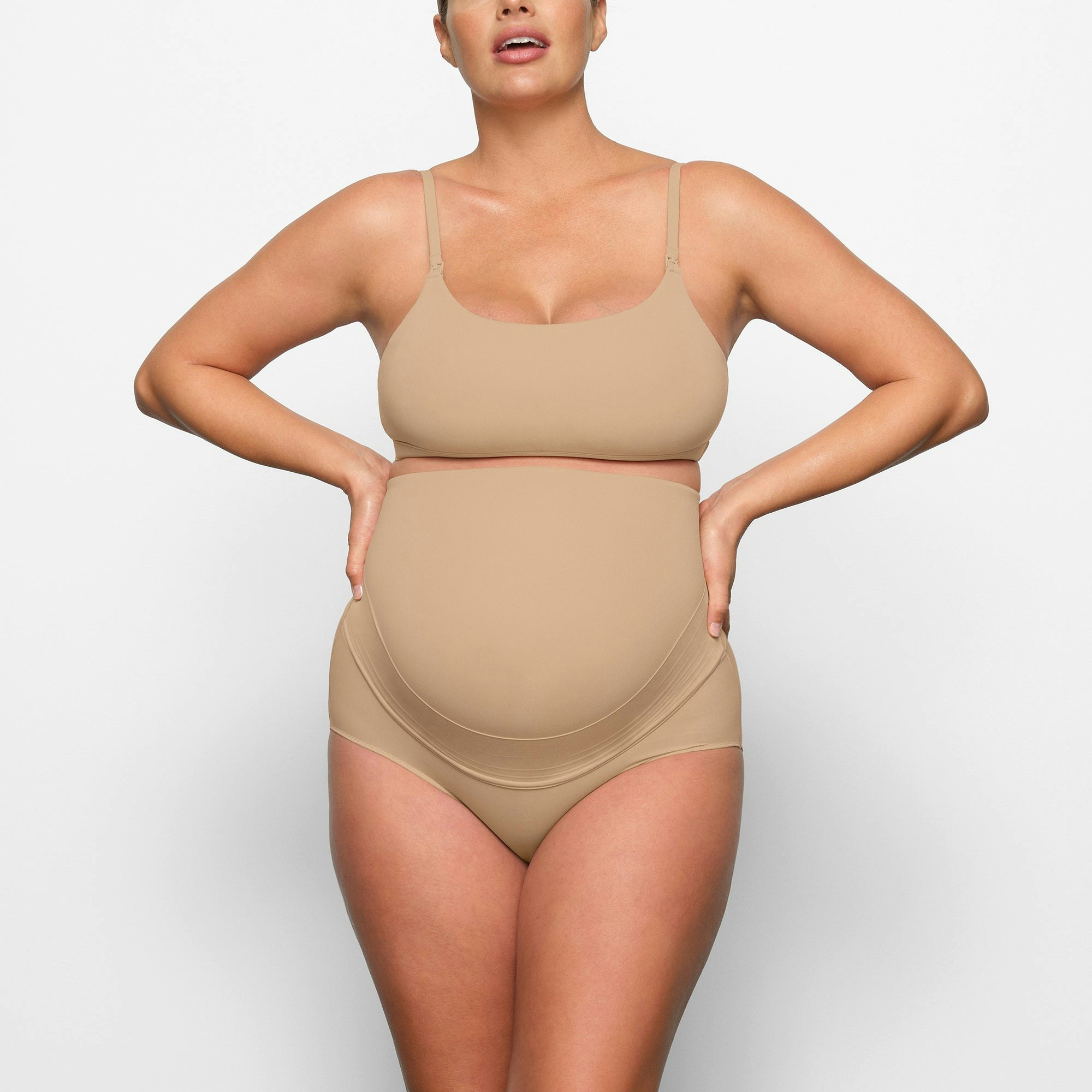 FITS EVERYBODY MATERNITY NURSING SCOOP BRALETTE WORN BY A MODEL IN FRONT VIEW | SEE: M, L, XL