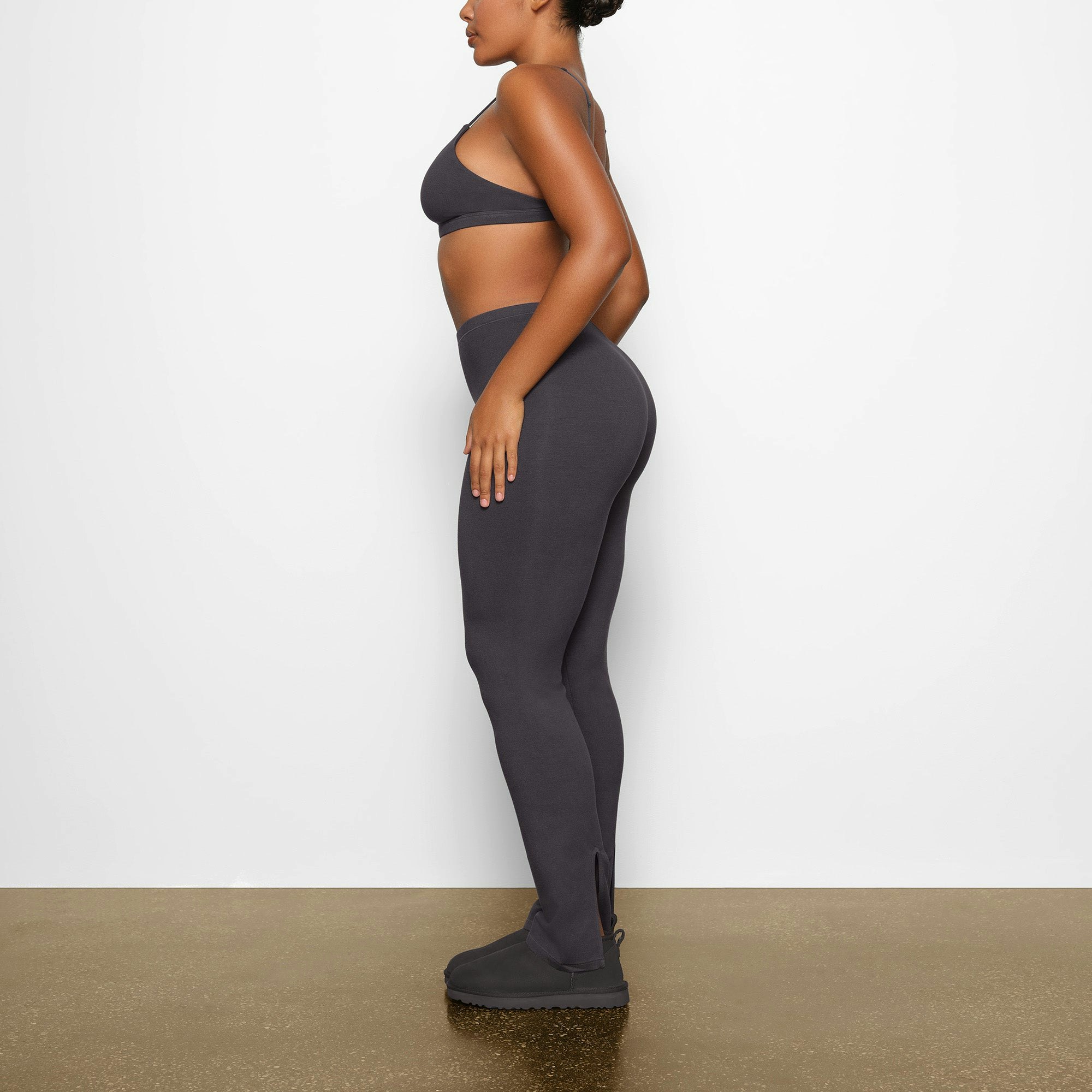 OUTDOOR SCOOP NECK BRALETTE ON A MODEL IN SIDE VIEW