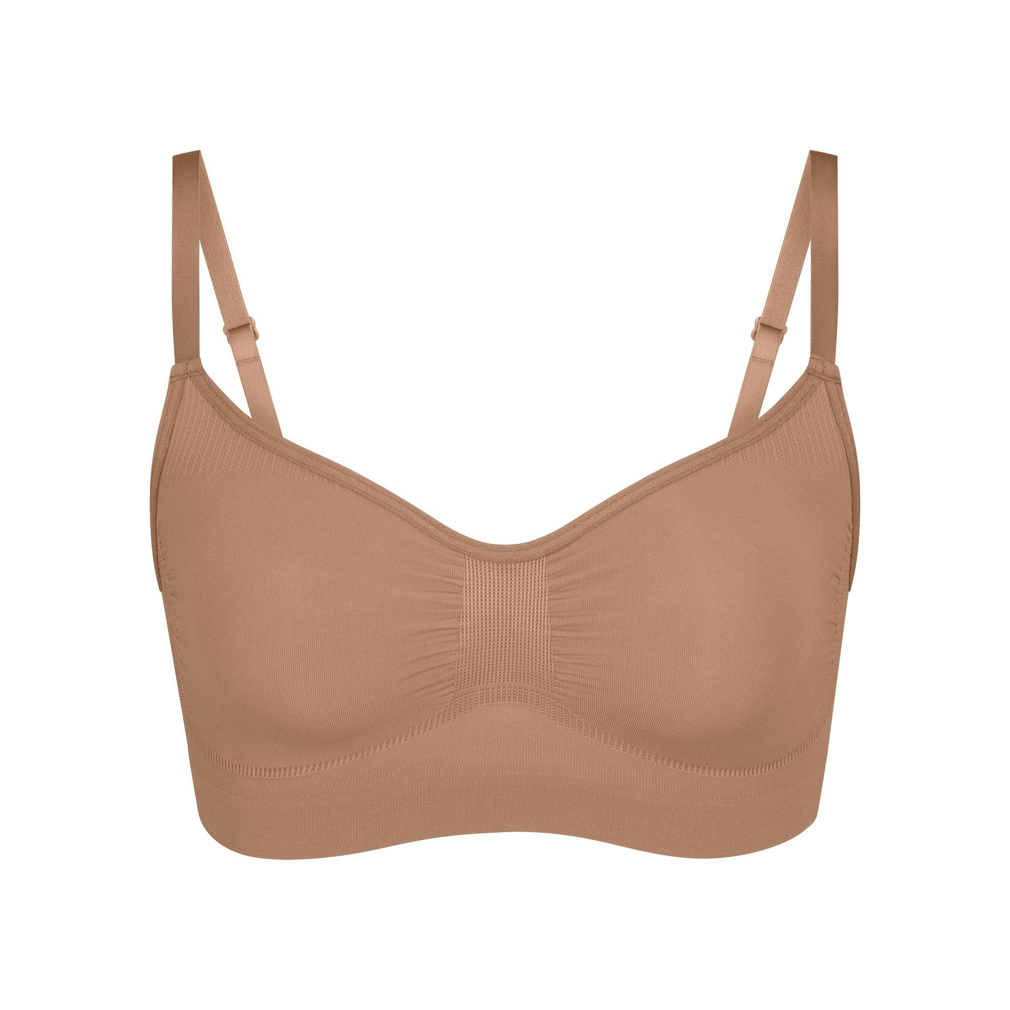 SEAMLESS SCULPT BRALETTE | SIENNA (SHAPEWEAR BRALETTES, BRAS) LAYS FLAT ON A WHITE BACKGROUND | FLT