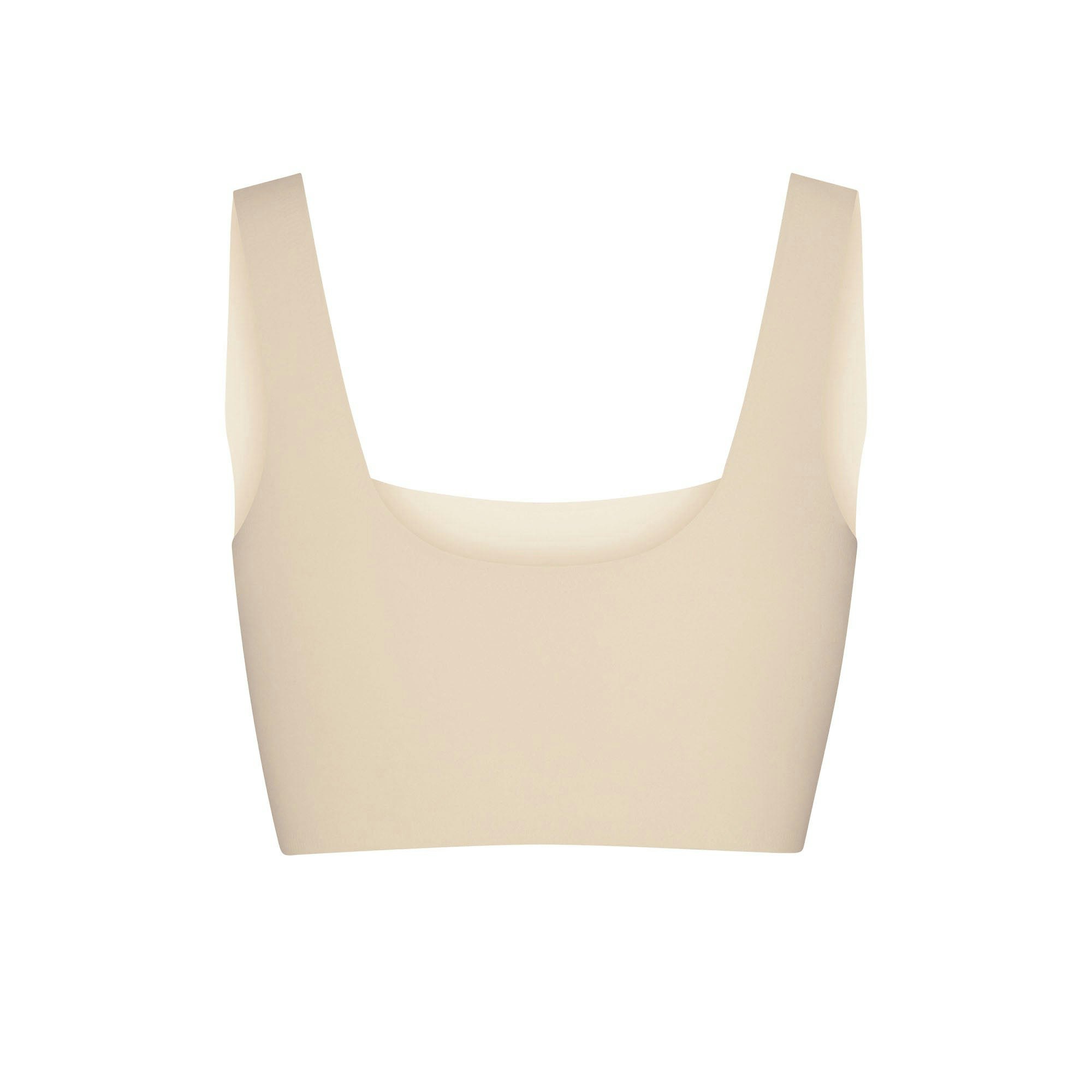 NAKED SCOOP LONGLINE BRA LAYS FLAT ON A WHITE BACKGROUND | FLT