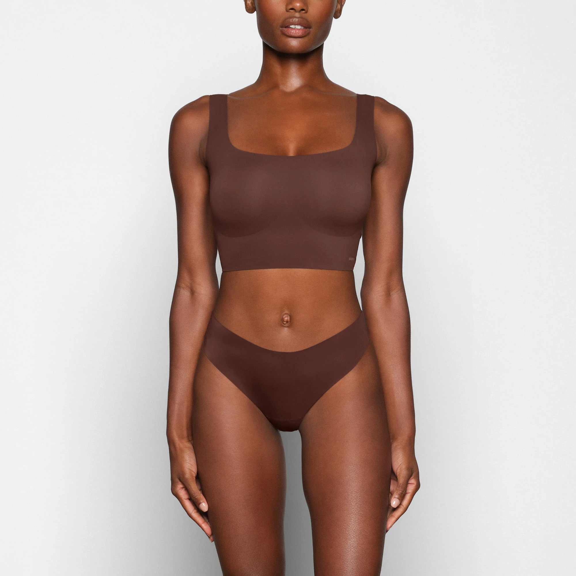 NAKED SCOOP LONGLINE BRA WORN BY A MODEL IN FRONT VIEW | SEE: XXS, XS, S