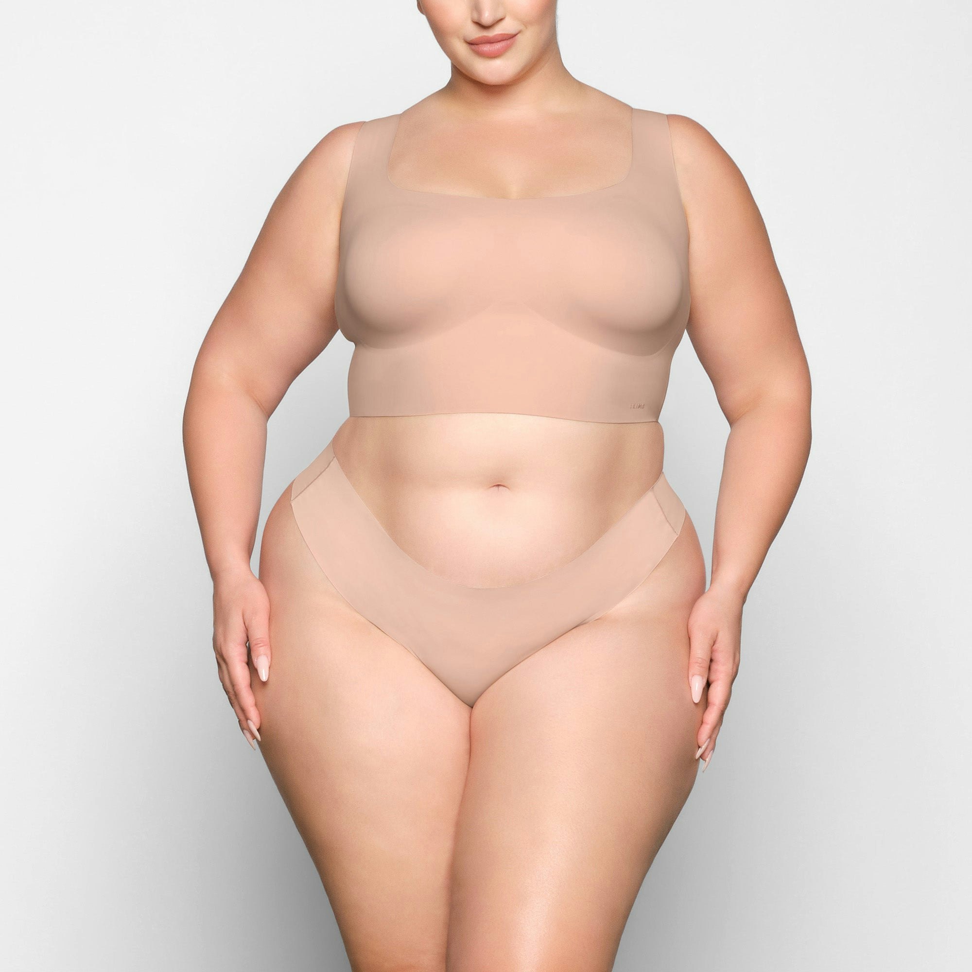 NAKED SCOOP LONGLINE BRA WORN BY A MODEL IN FRONT VIEW | SEE: 2X, 3X, 4X