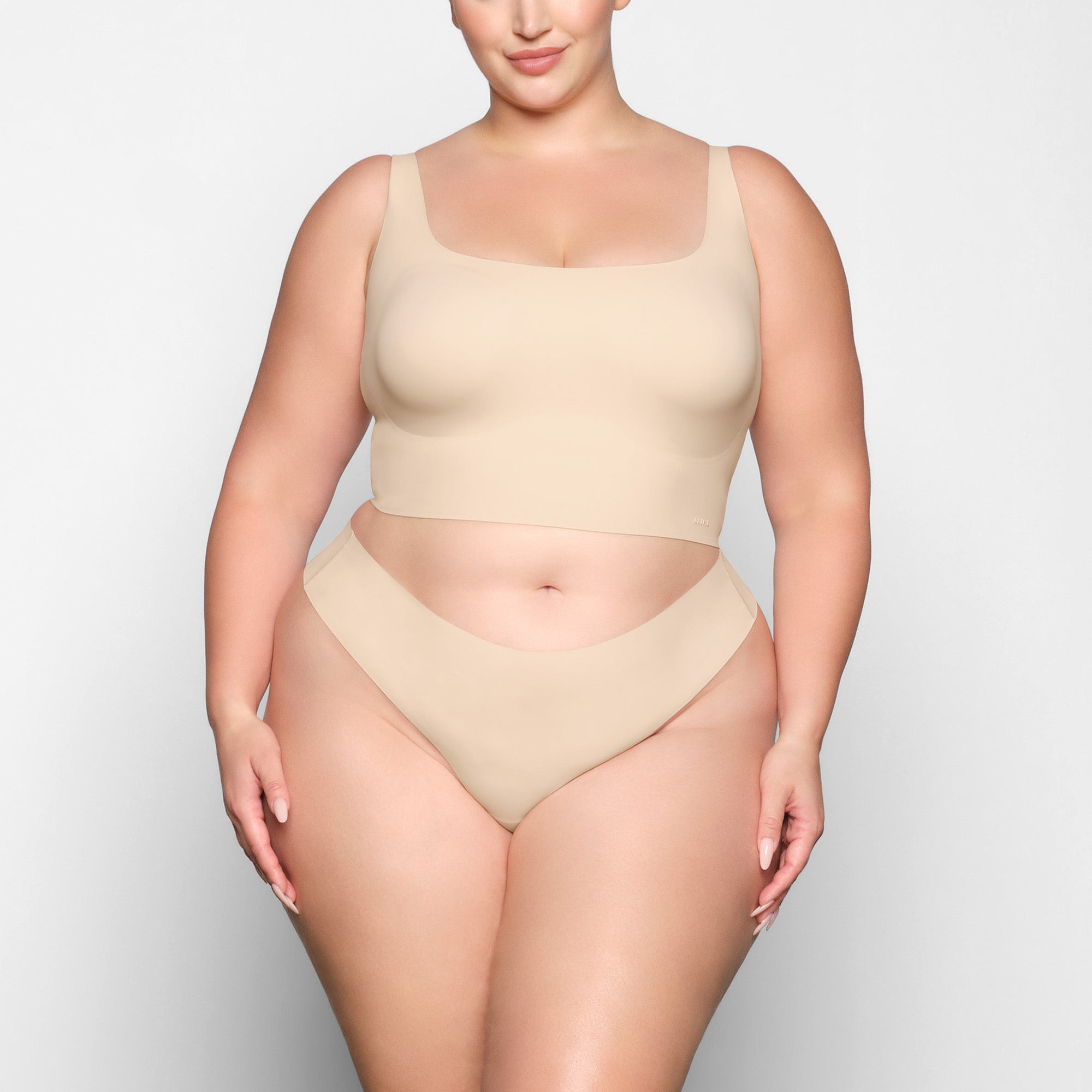 NAKED SCOOP LONGLINE BRA WORN BY A MODEL IN FRONT VIEW | SEE: 2X, 3X, 4X