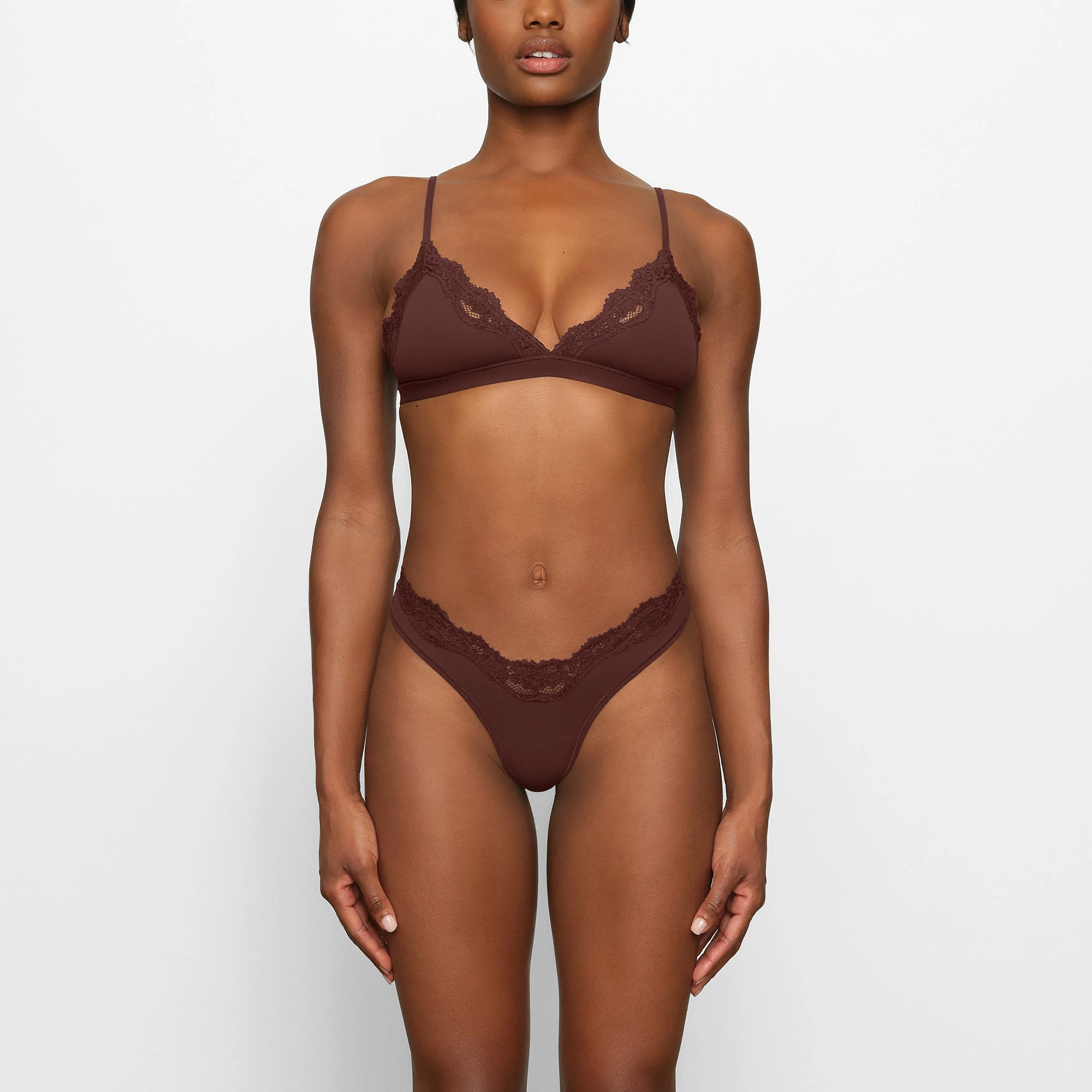 FITS EVERYBODY LACE TRIANGLE BRALETTE WORN BY A MODEL IN FRONT VIEW | SEE: XXS, XS, S
